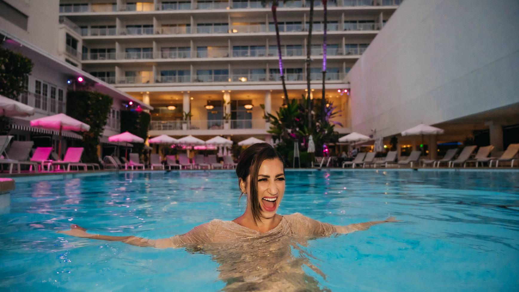 Woman laughing in pool