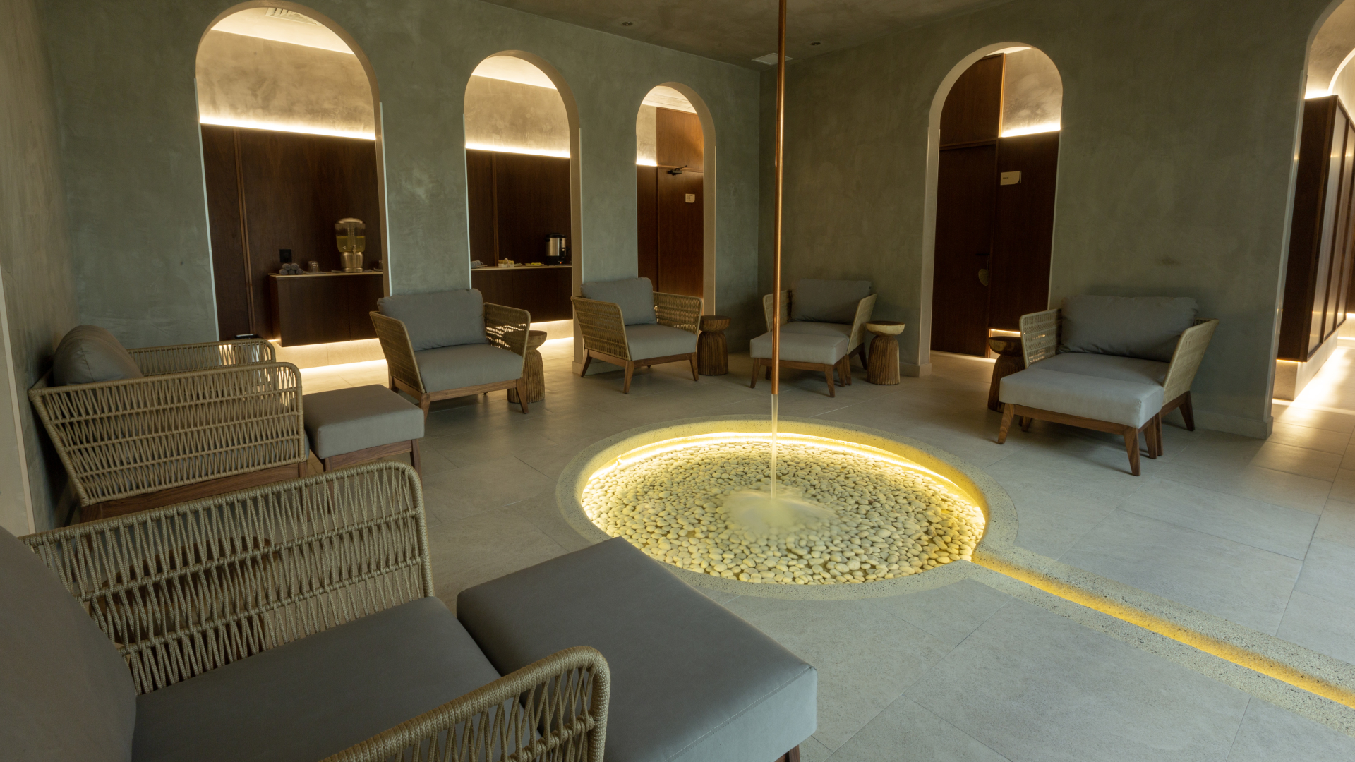 Spa area with comfortable seating and water feature