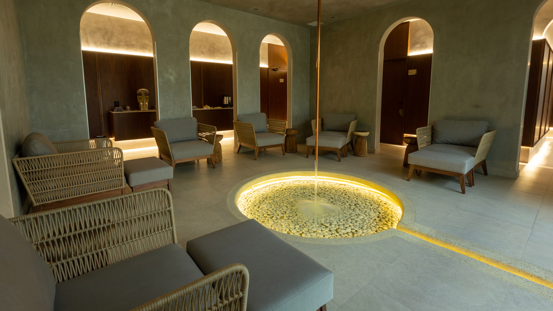 Spa area with comfortable seating and water feature