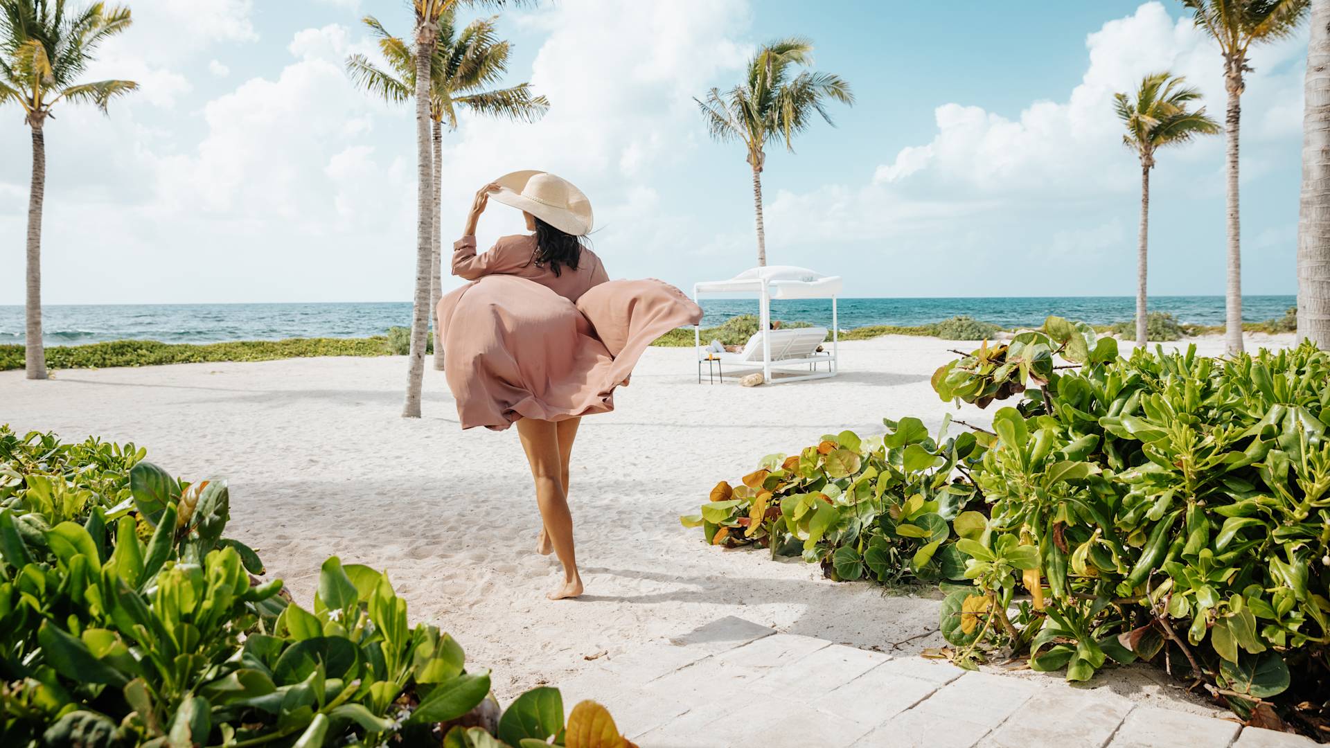 Woman walking on beach