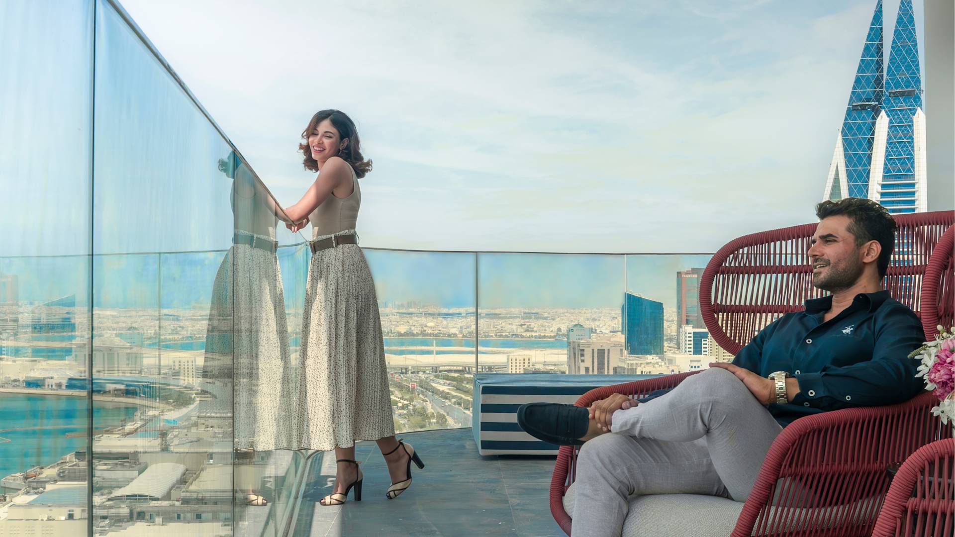 Couple on penthouse balcony
