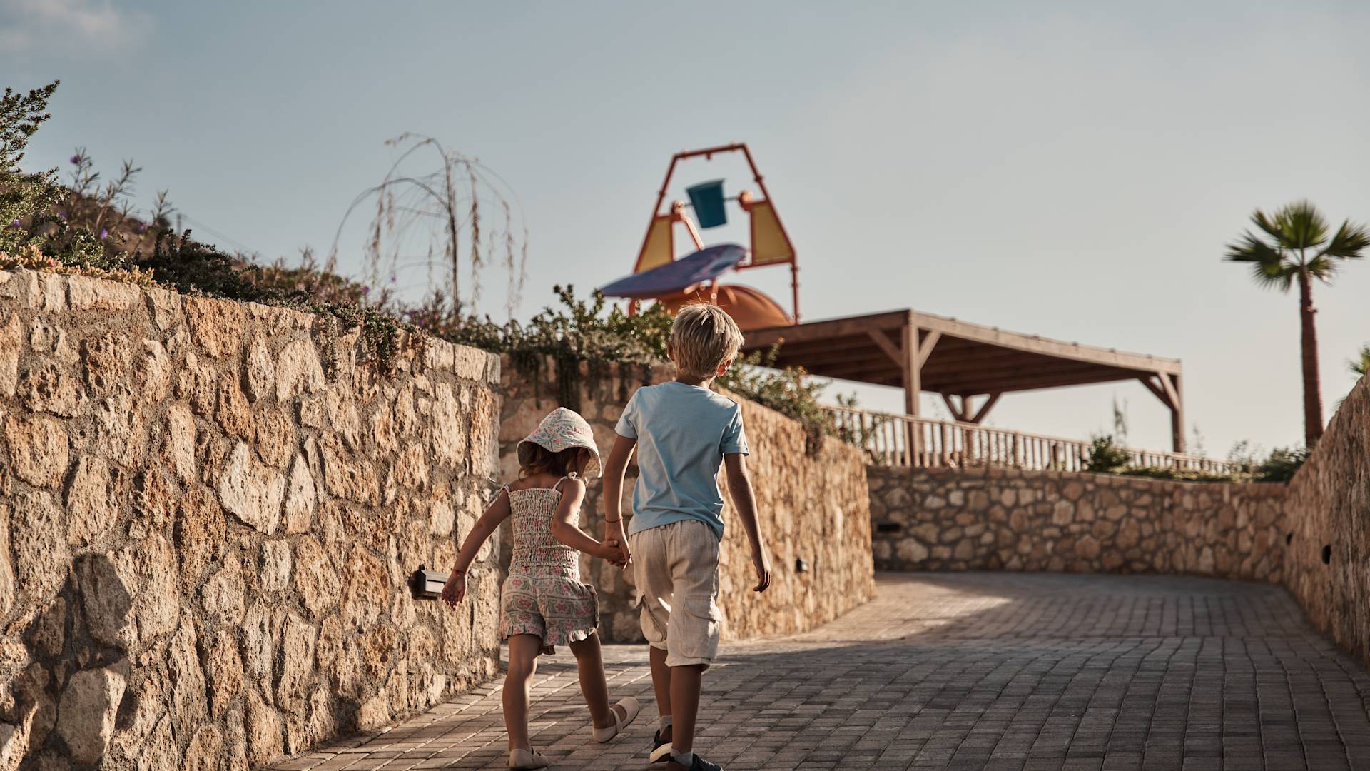 Kids Walking Towards a Playground Outdoors