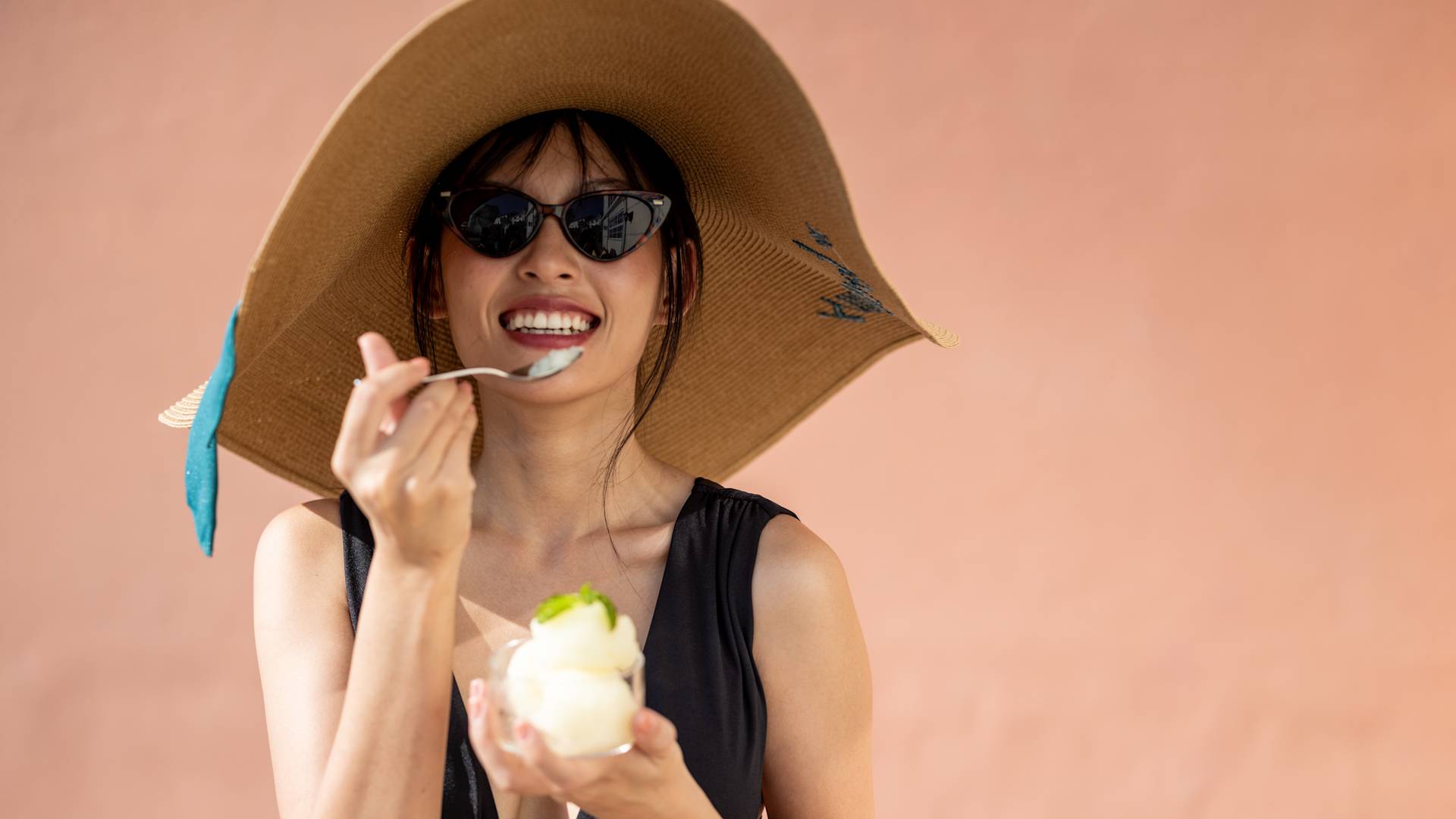 person wearing sunhat and hat