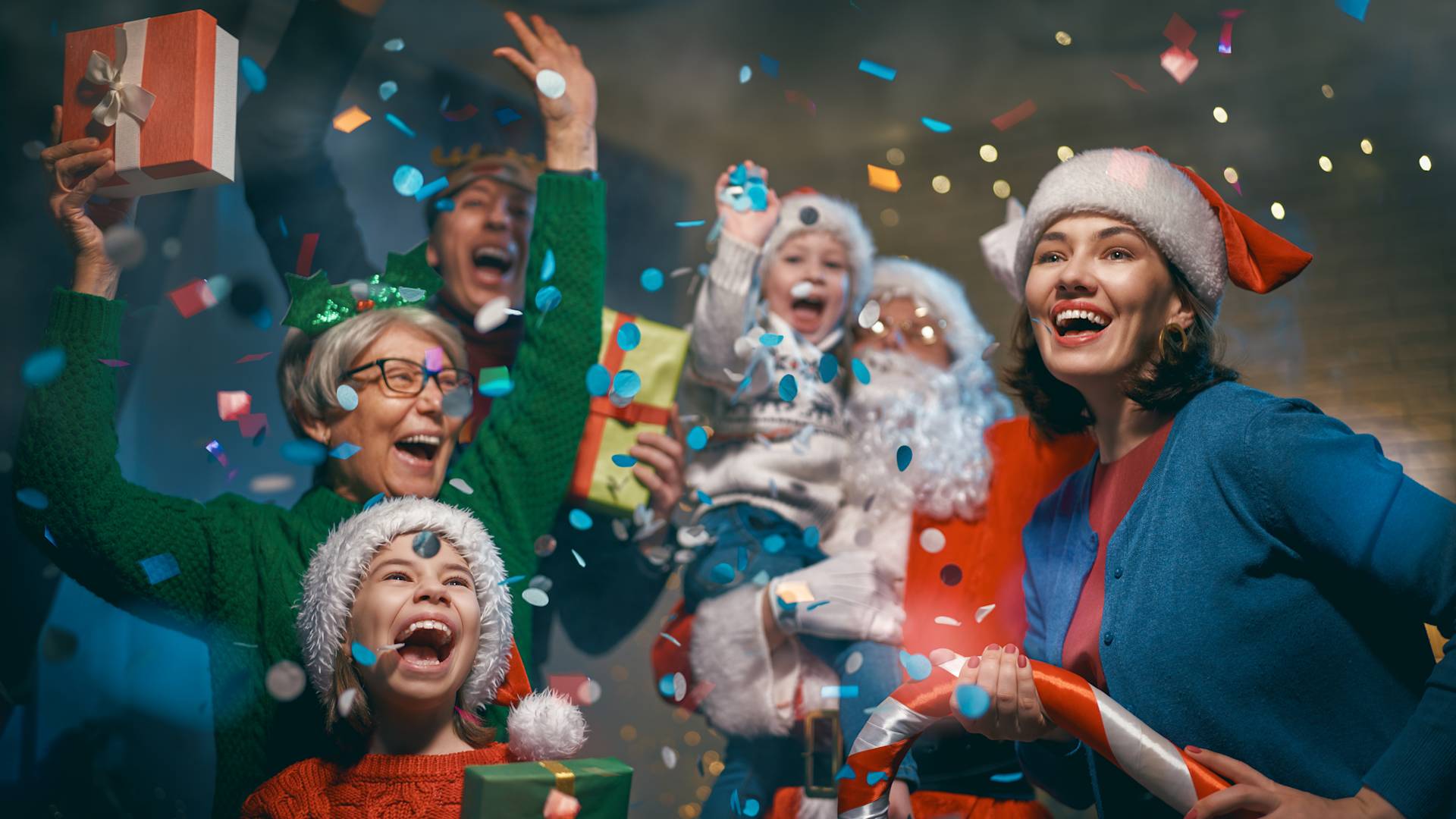guests at a christmas party with santa