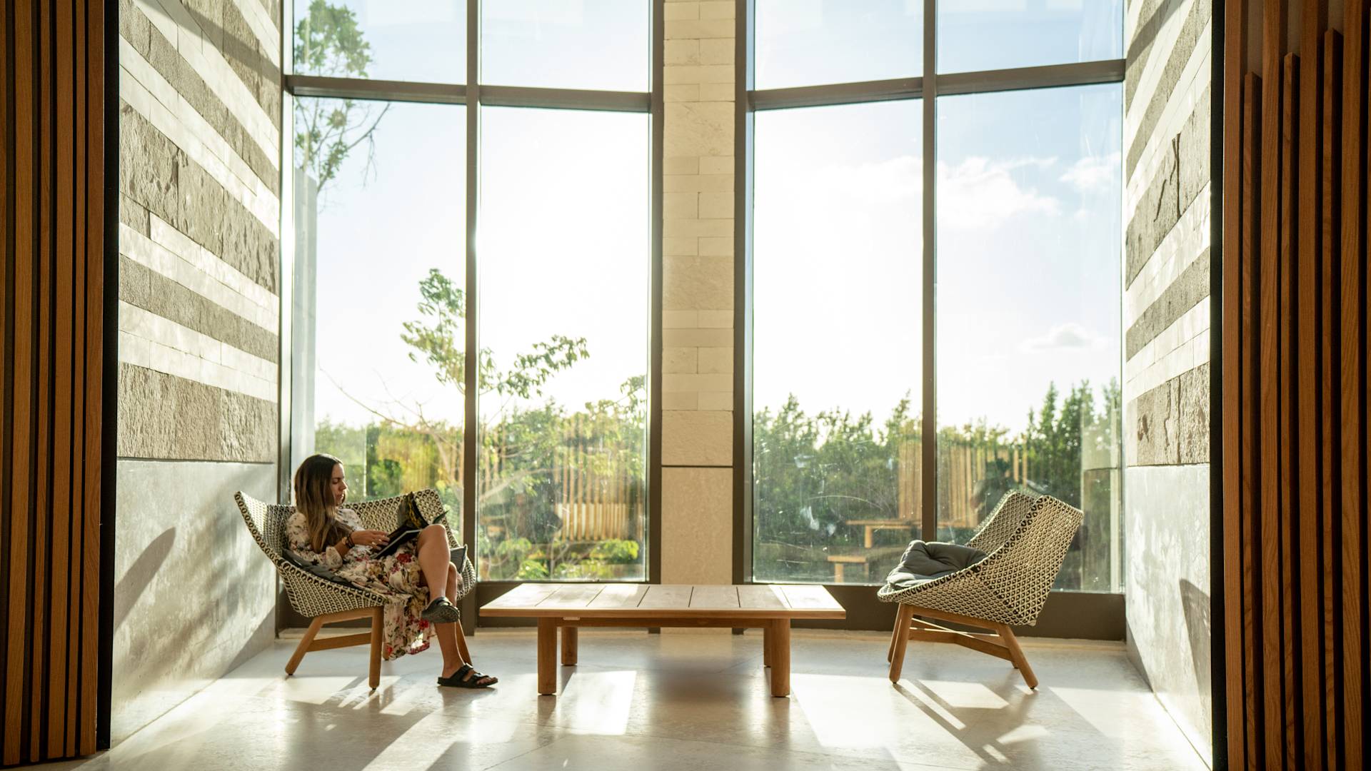 woman lounging in the lobby