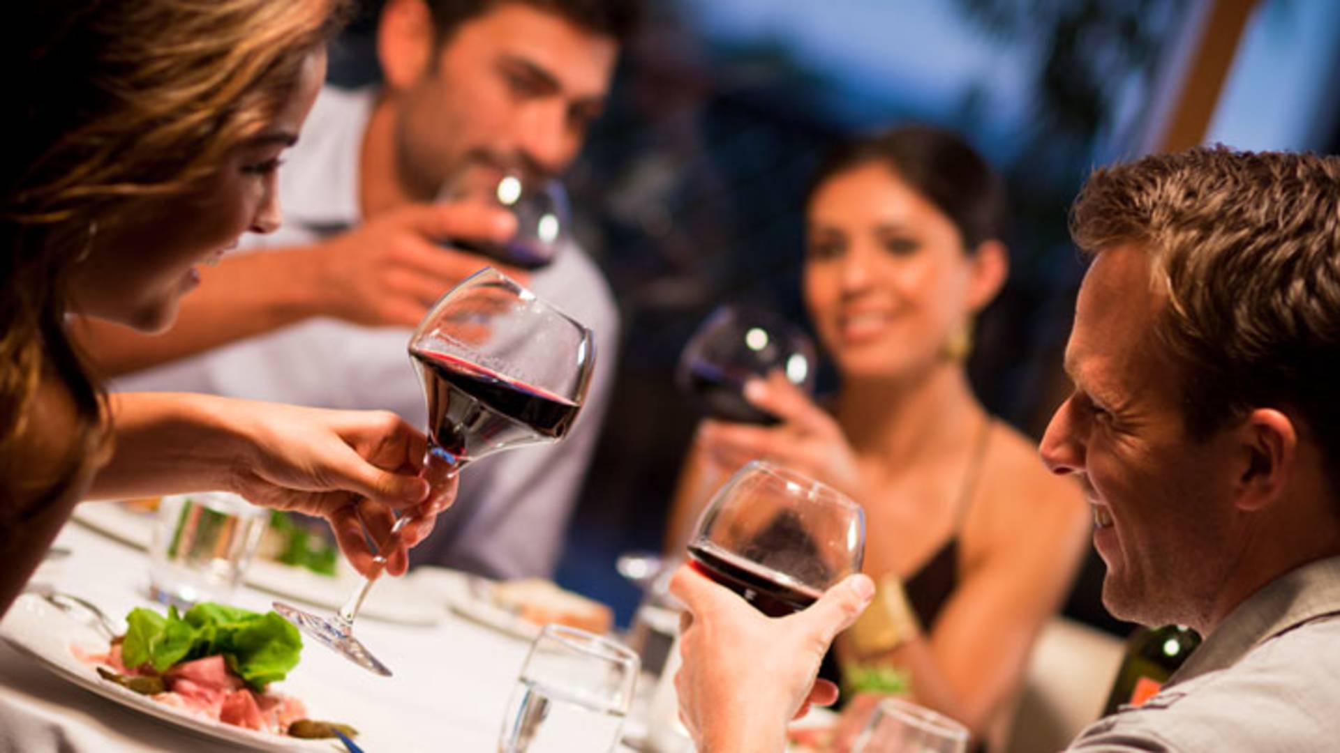 Hilton Hotels and Resorts - Family at dinner