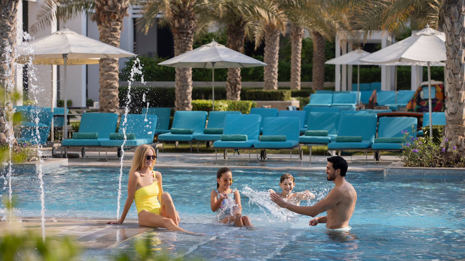 Family Playing in the Pool