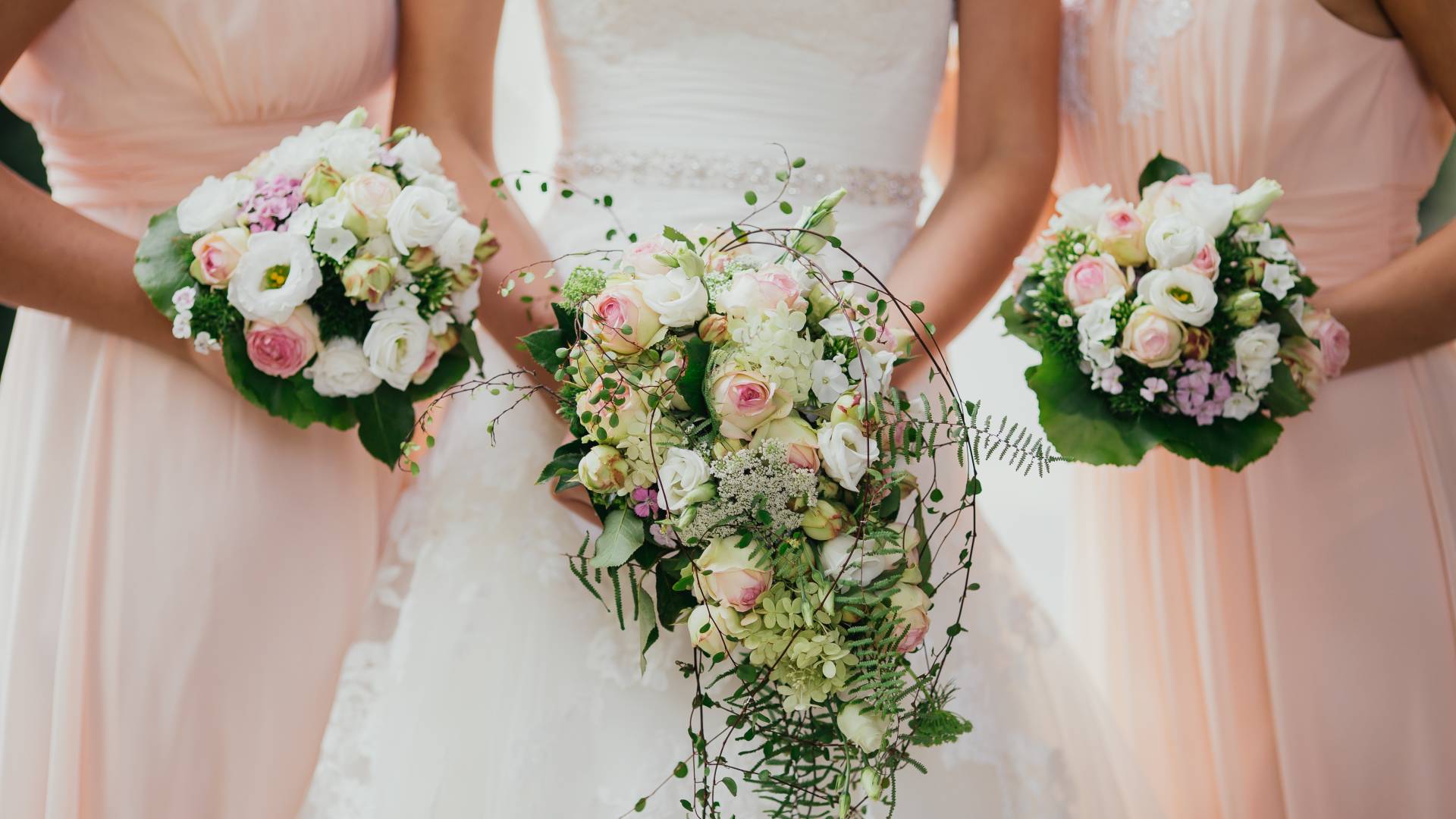 Bride and Bridesmaids with Flowers
