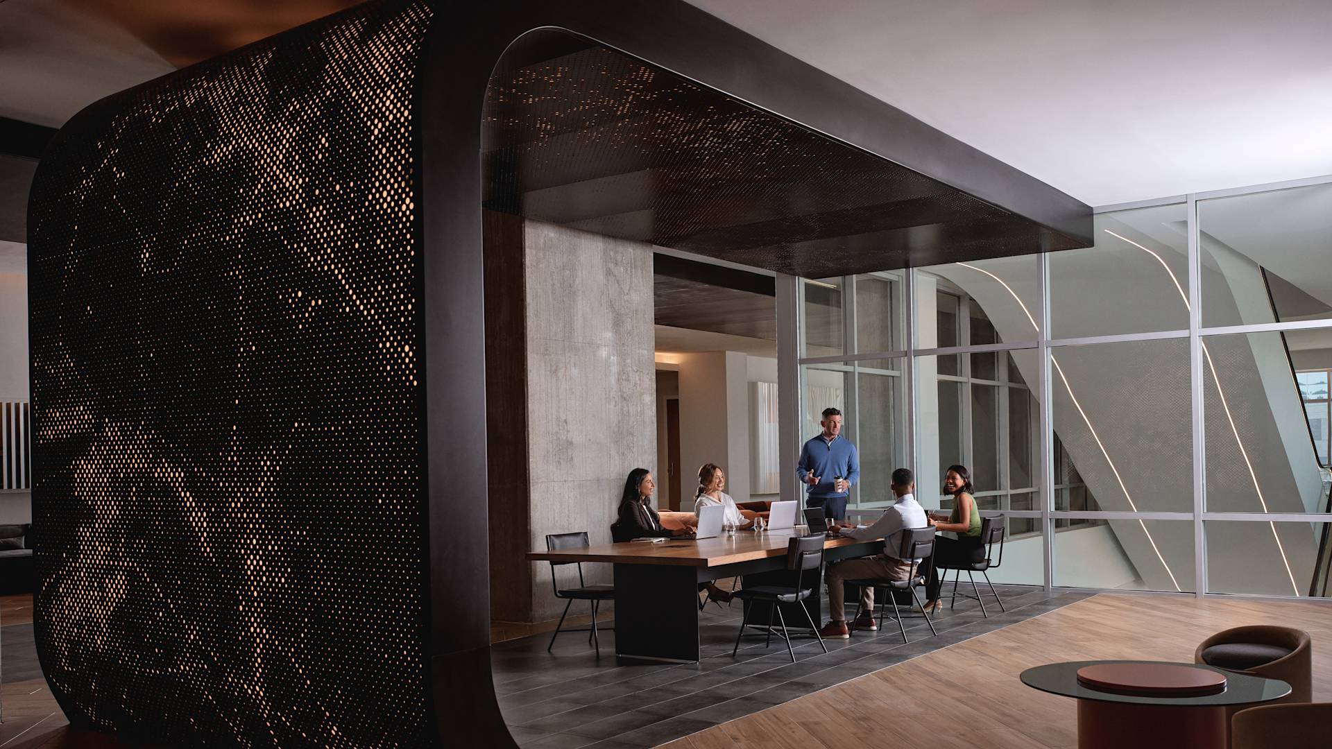 People sitting at table in lobby area
