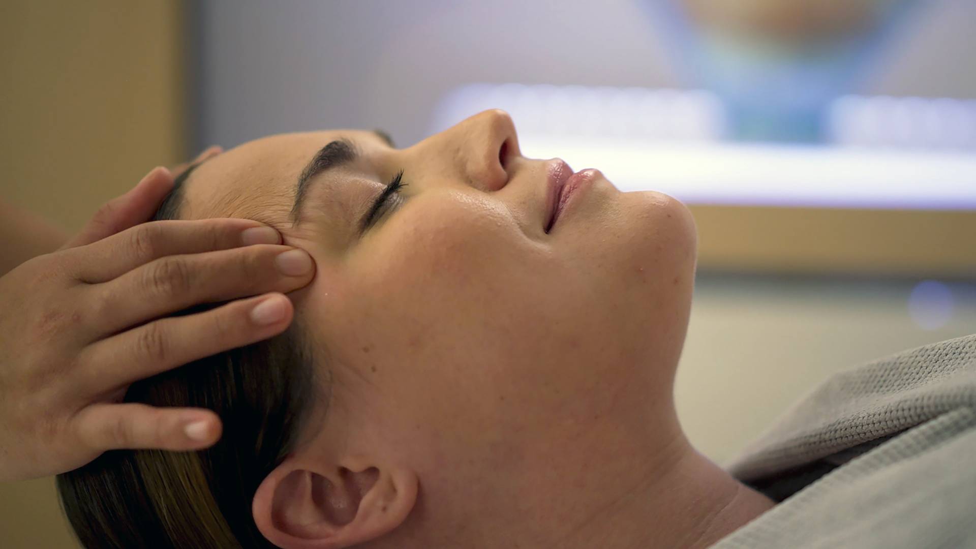 a Woman Getting a Head Massage at Spa Signia