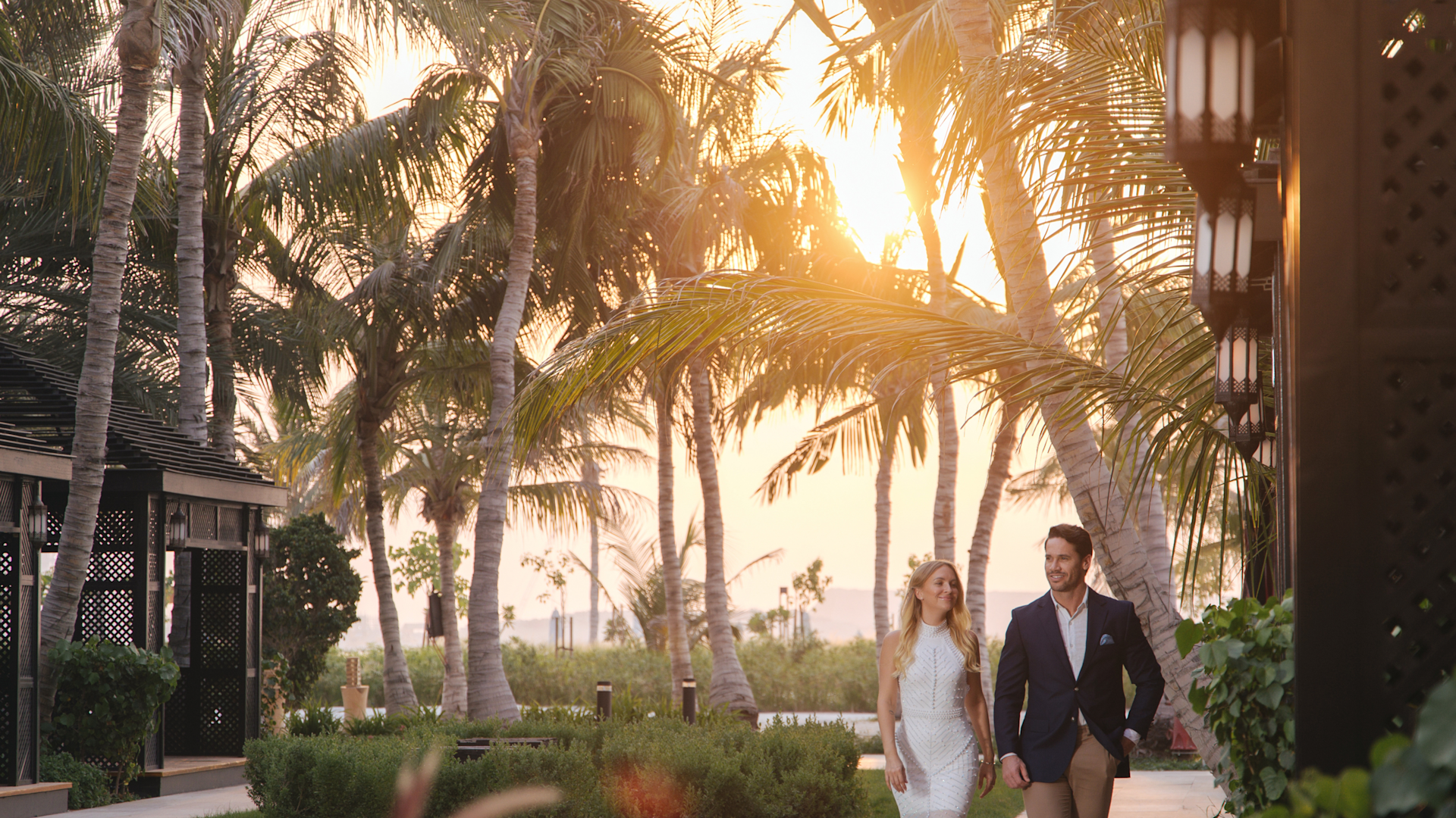 Couple walking at sunset