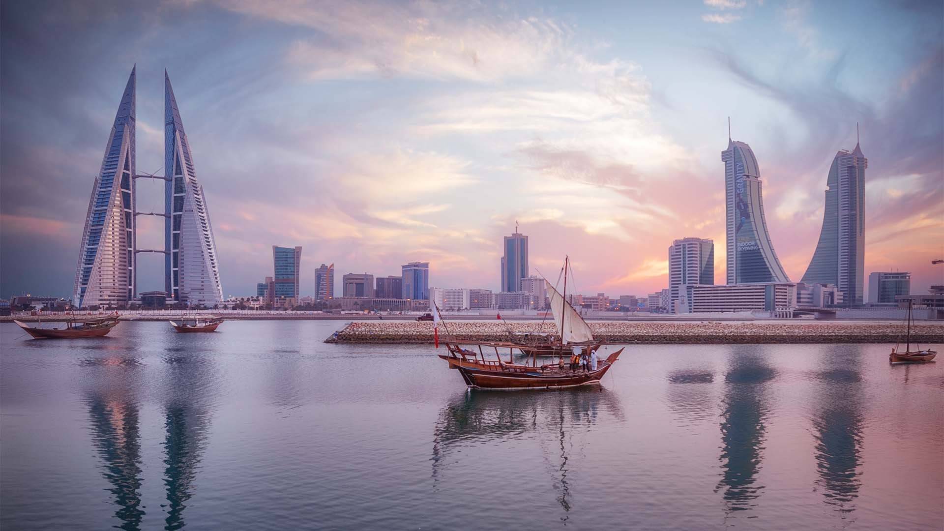 View of Hotel Exterior from the Sea at Sunset