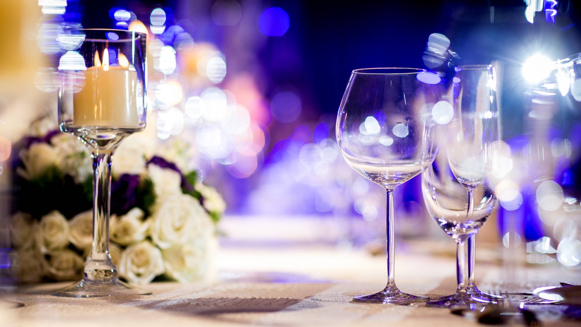 Detail of Glasses on a Table in a Ballroom Setup for a Wedding Celebration