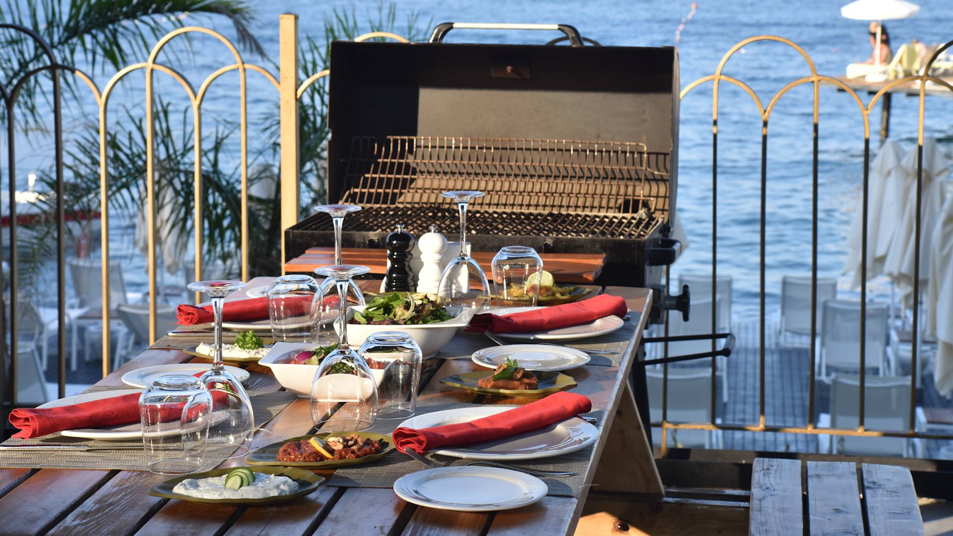 Dining Outdoors by the Water at BBQ Restaurant