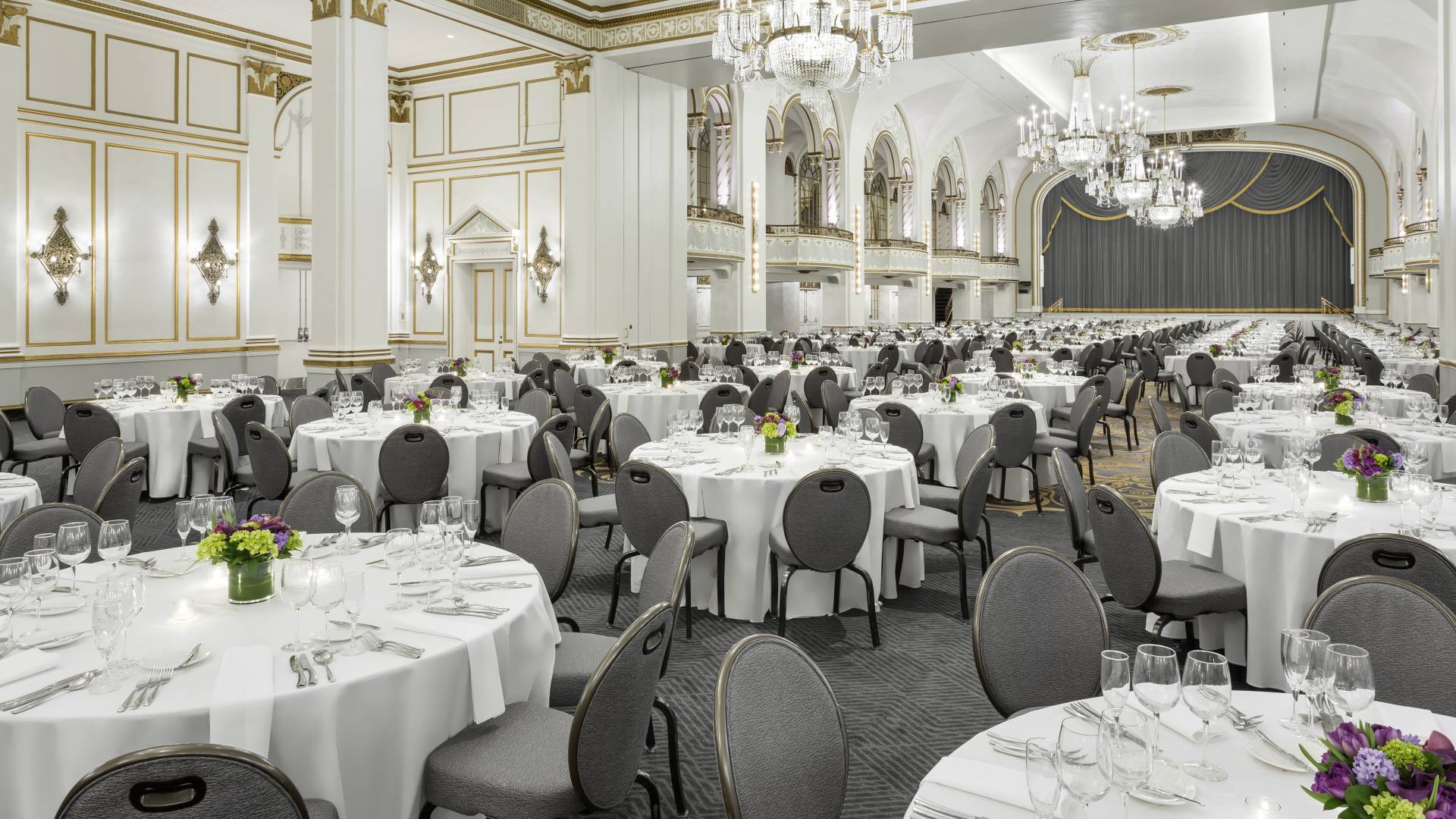 Grand Ballroom with chandeliers and chairs