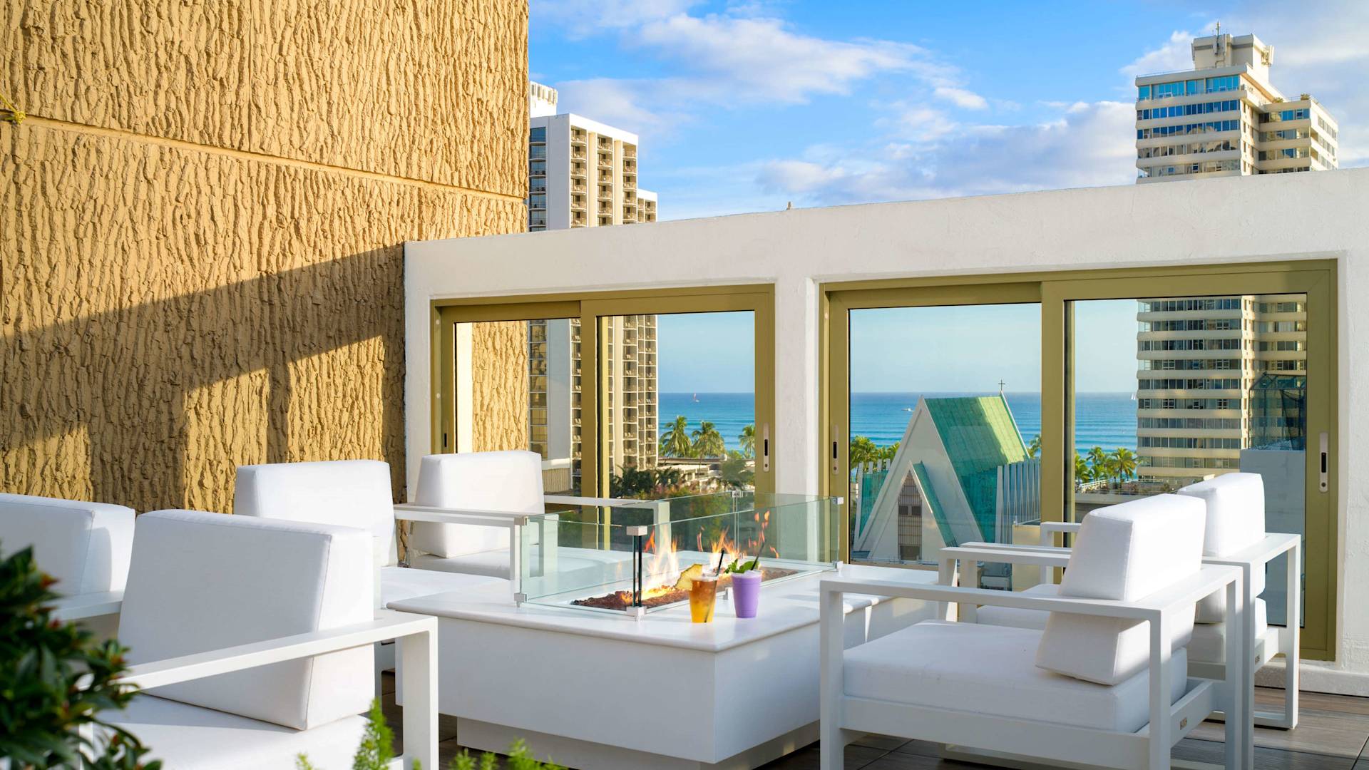 outdoor pool deck, fire pit, view of the water