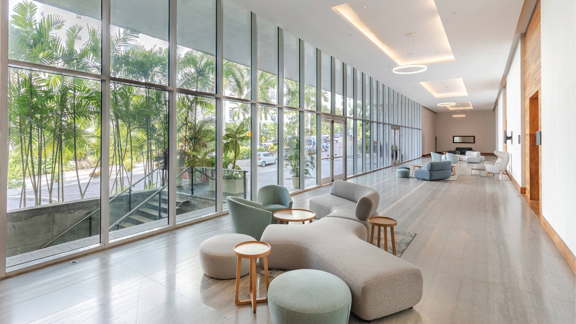 Foyer Ready for a Meeting with Seating Area and Large Windows