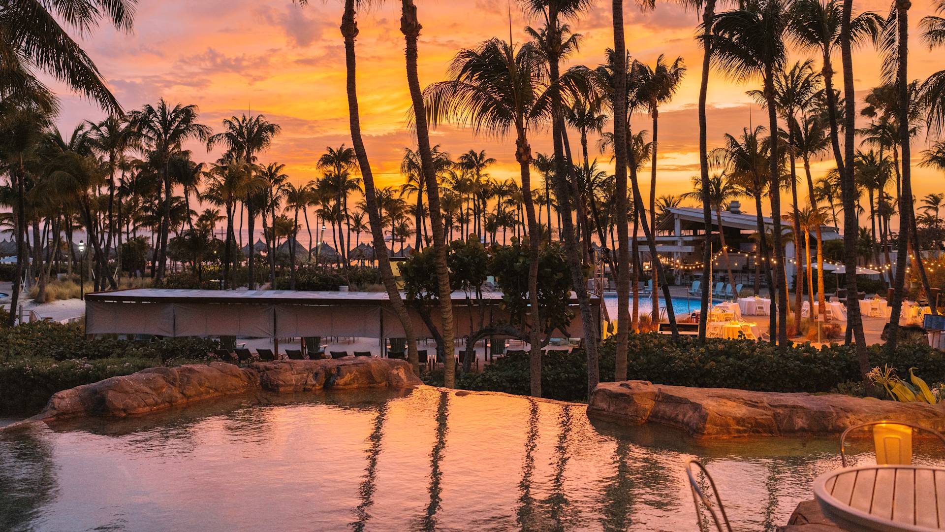 Outdoor seating space with sunset view