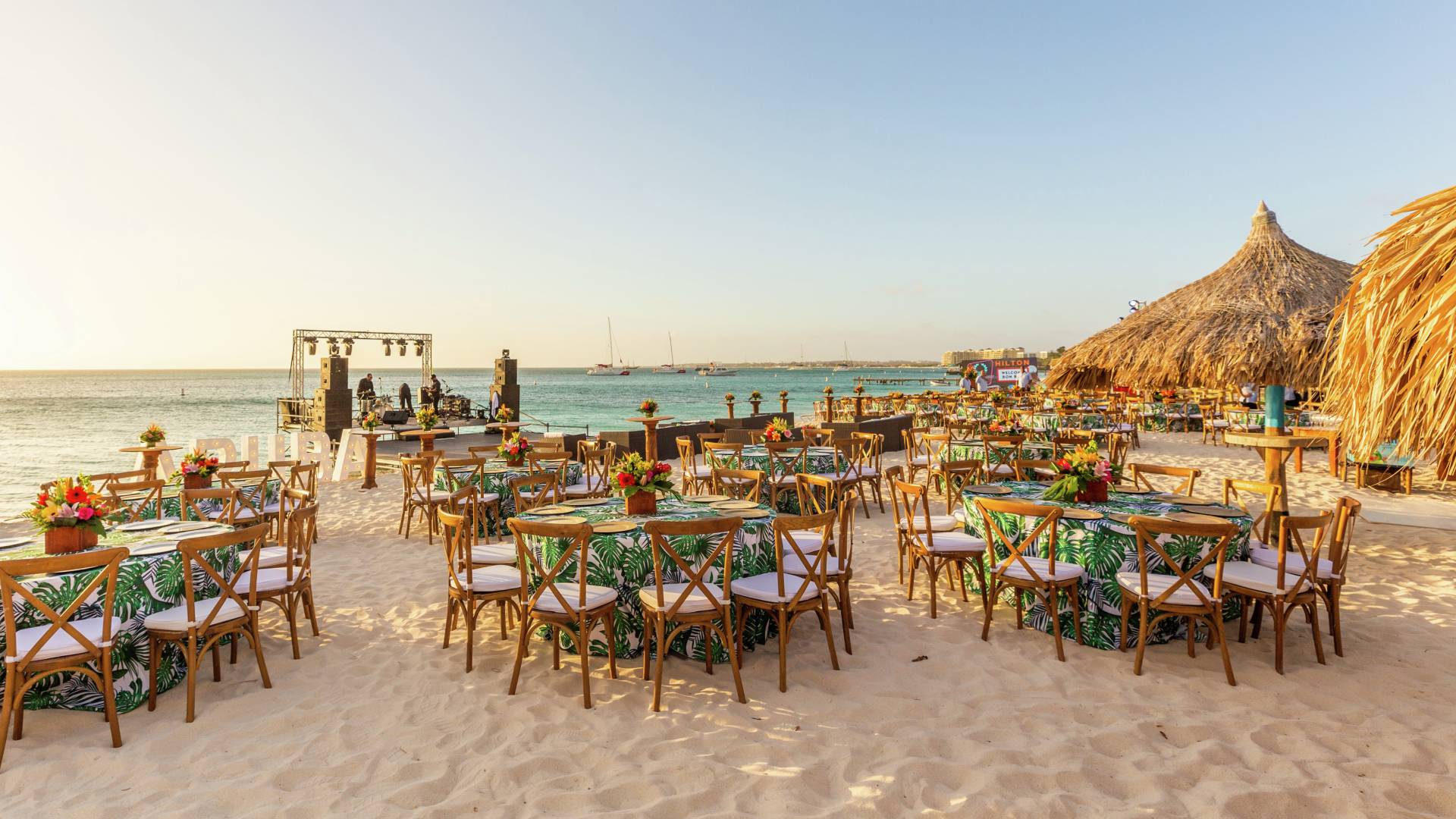 dinner tables on a beach