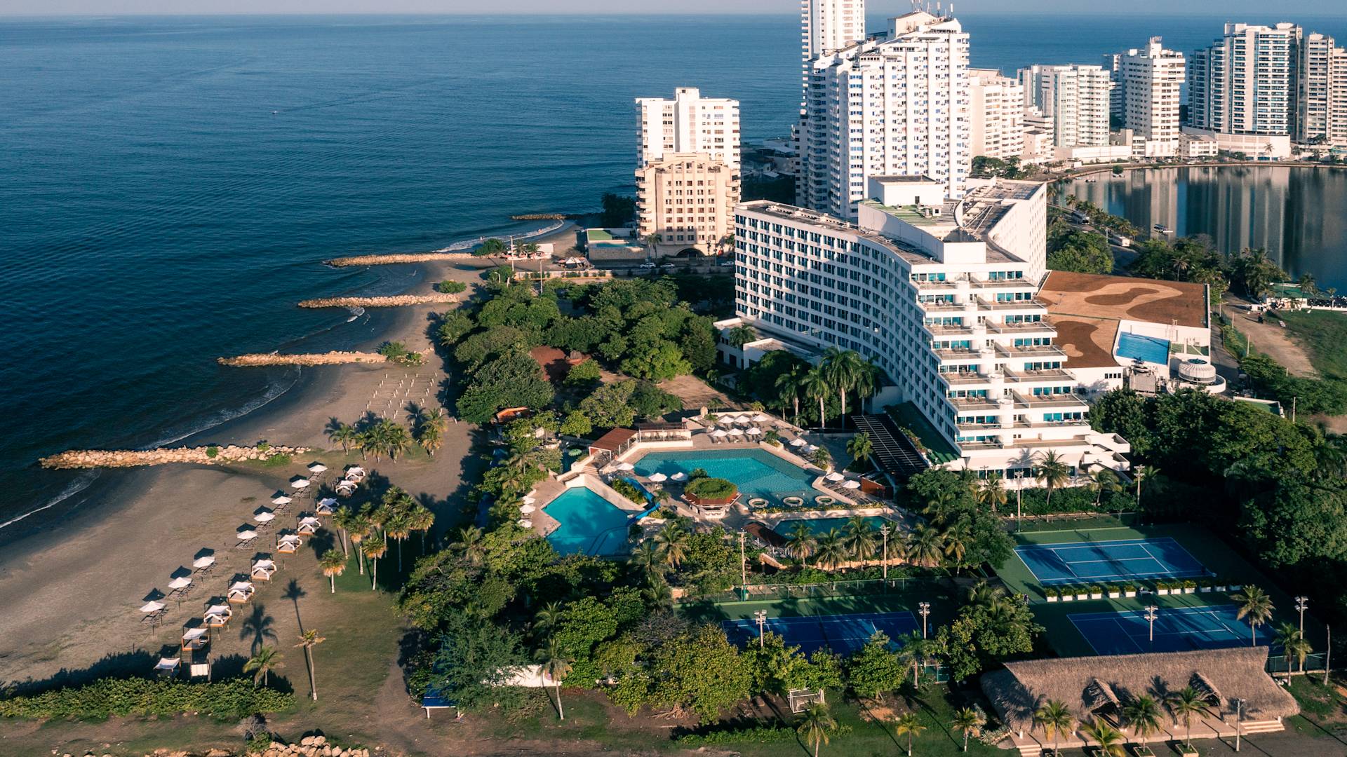 aerial view of hotel property and ocean