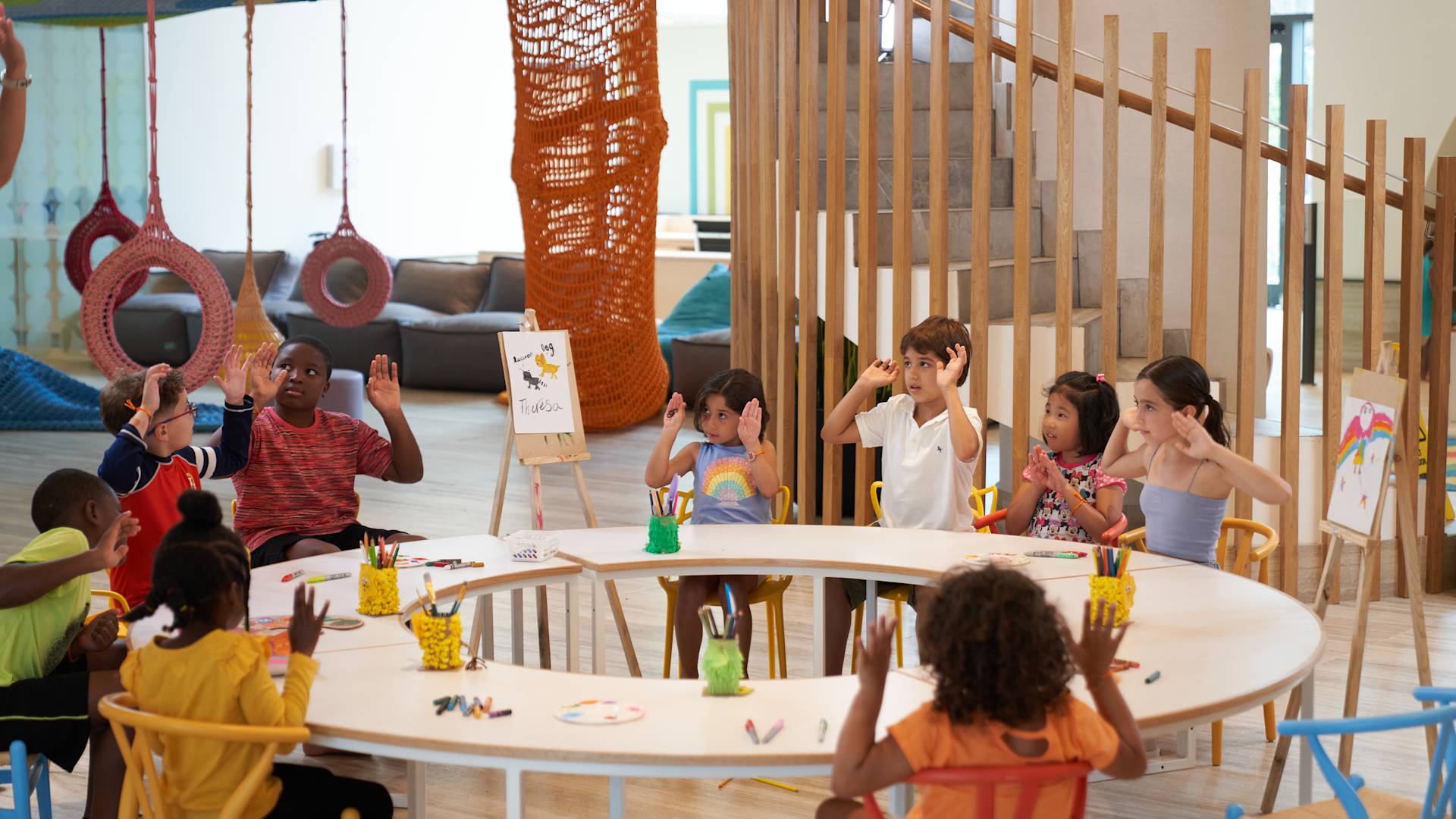 kids sitting around a table