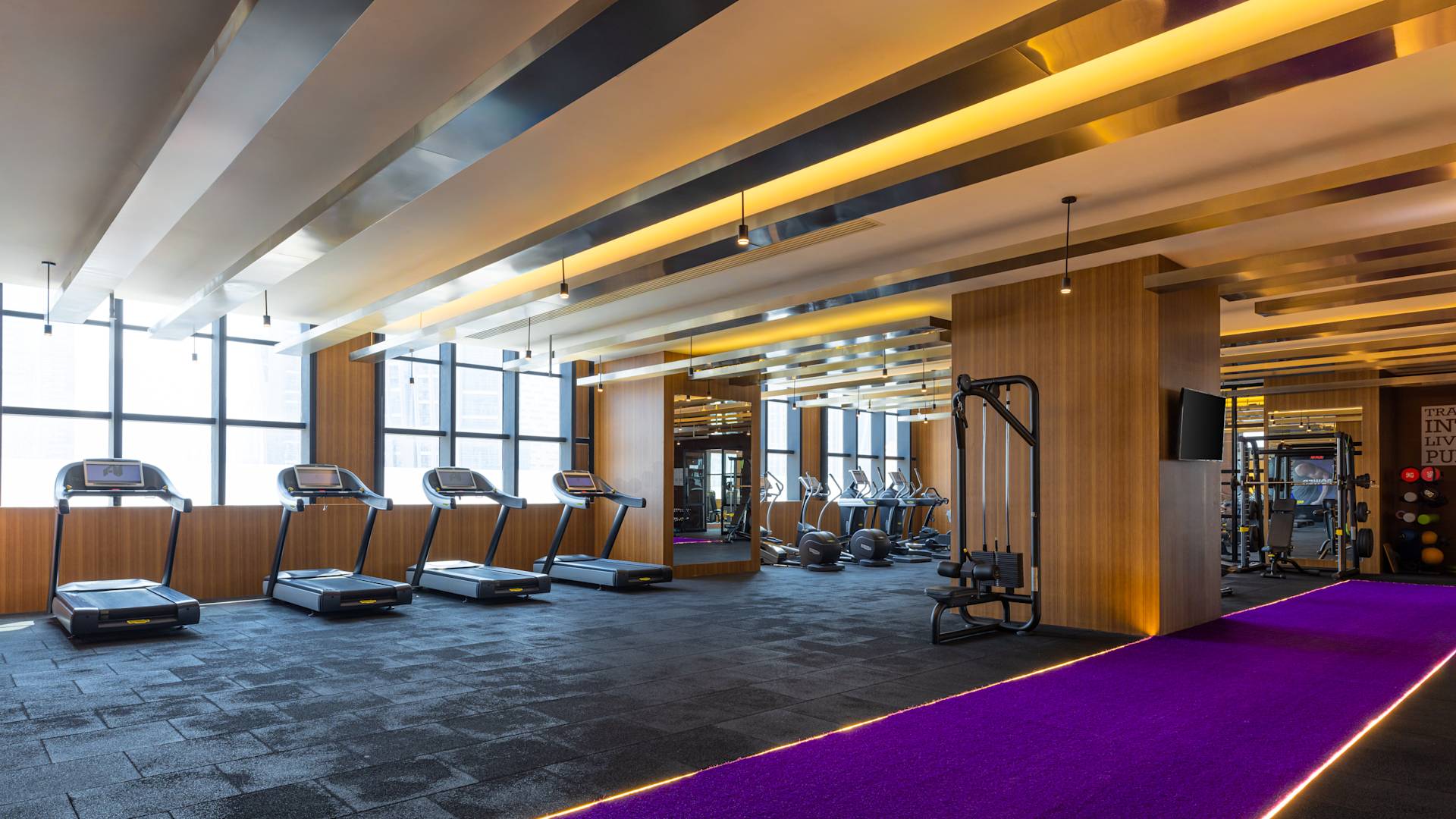 purple flooring in hotel fitness center