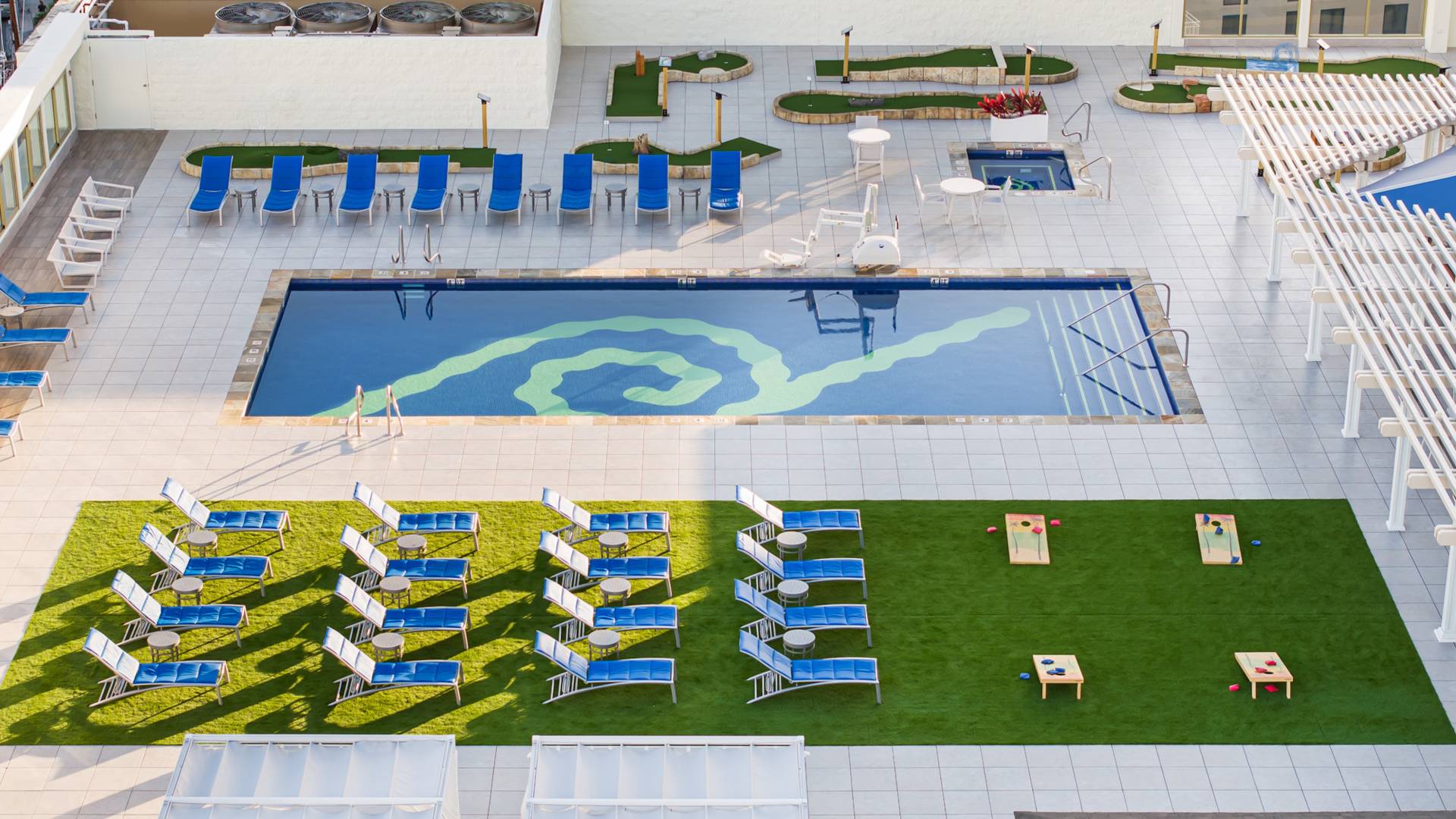 Pool with lounger from aerial view