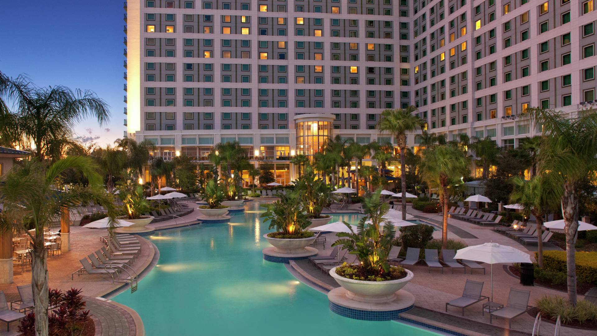 Hotel Exterior and Pool at Dusk