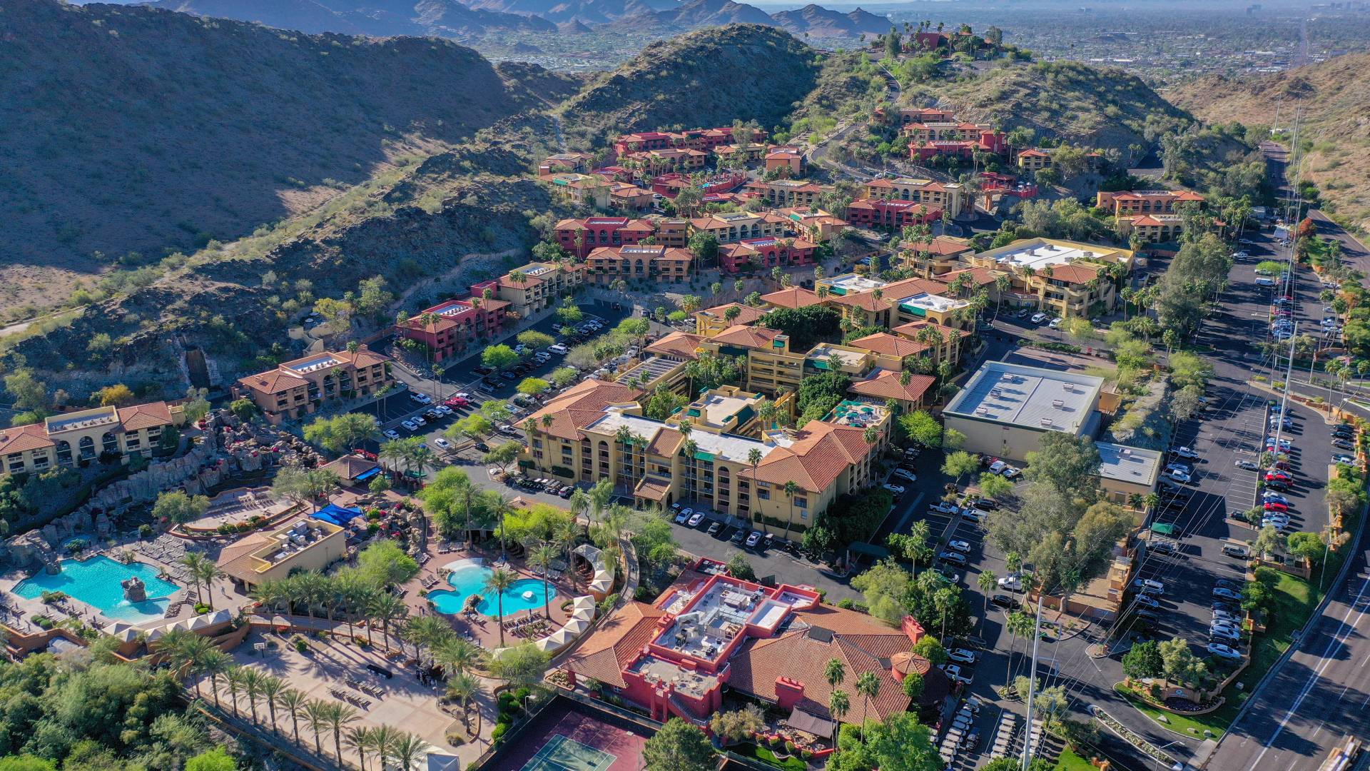 Aerial View of hotel, pools and mountains