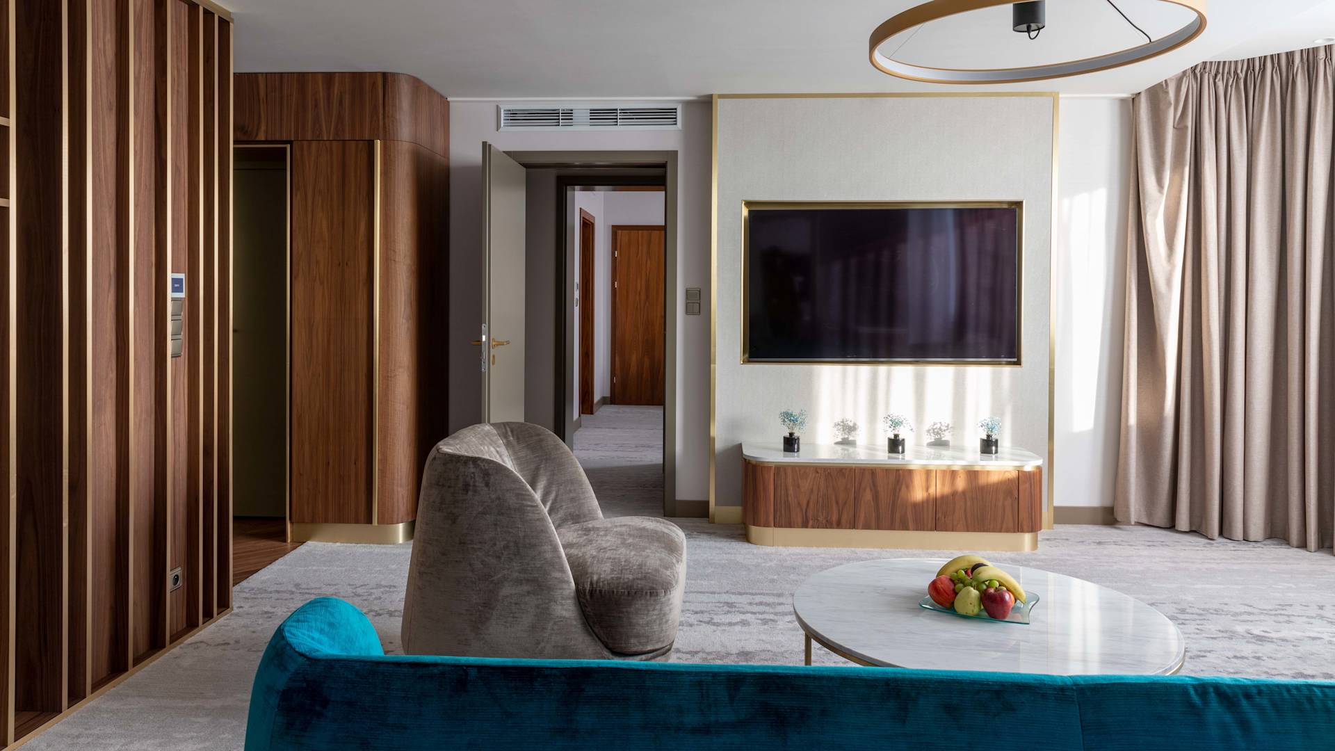 Royal Suite Living Area with sofa, chair and tv