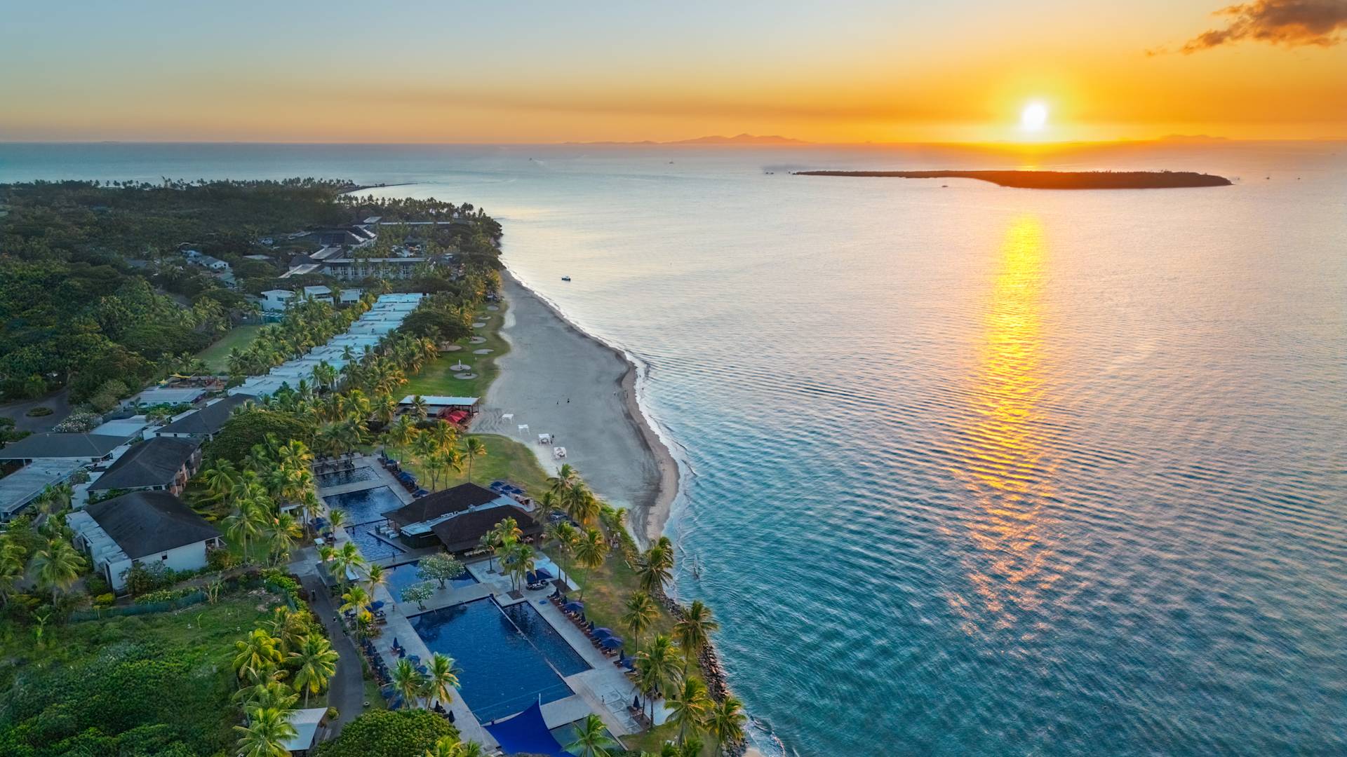 Aerial view of resort at sunset