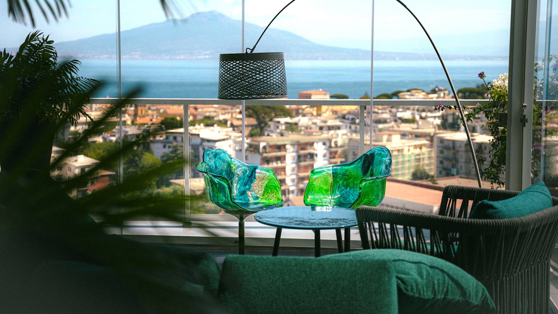 Seating Area at Happyssimo Restaurant with City and Coast Views