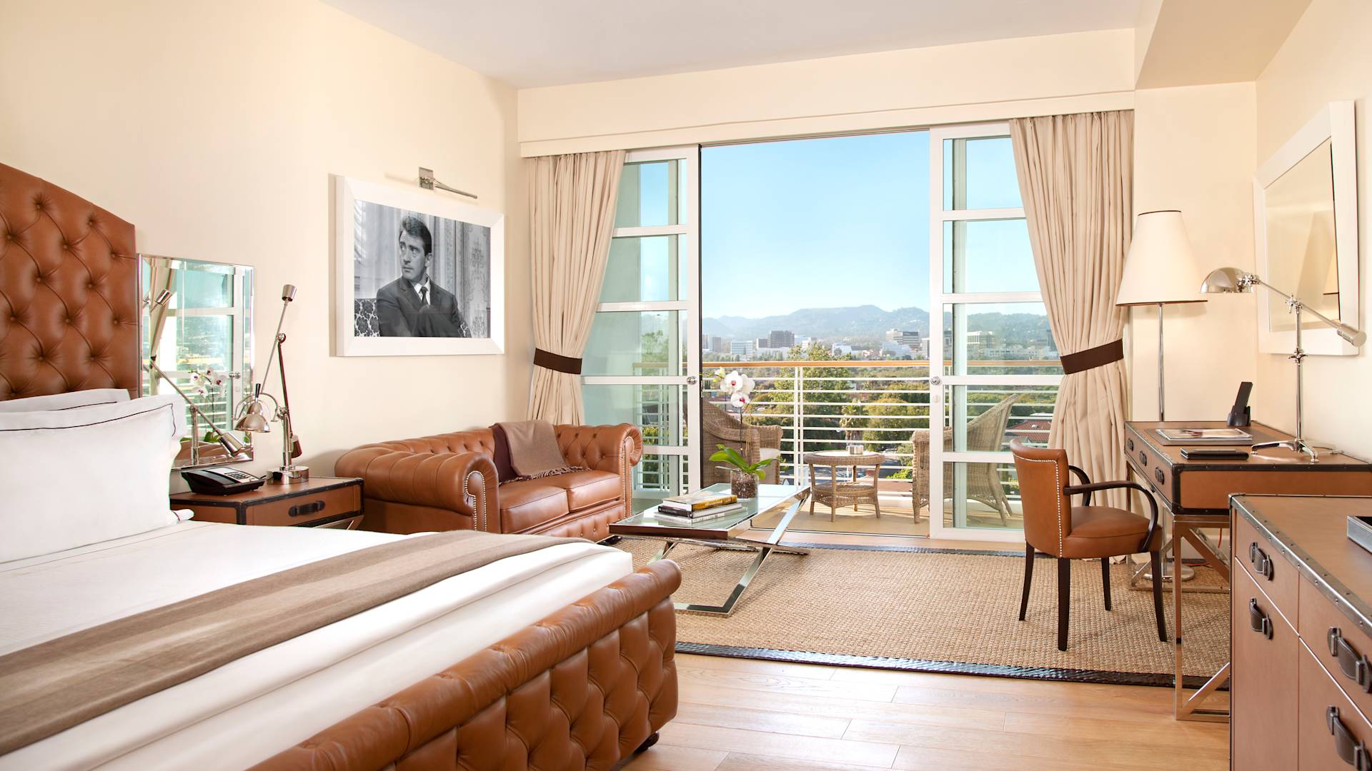 Bed in room with view of lounge area