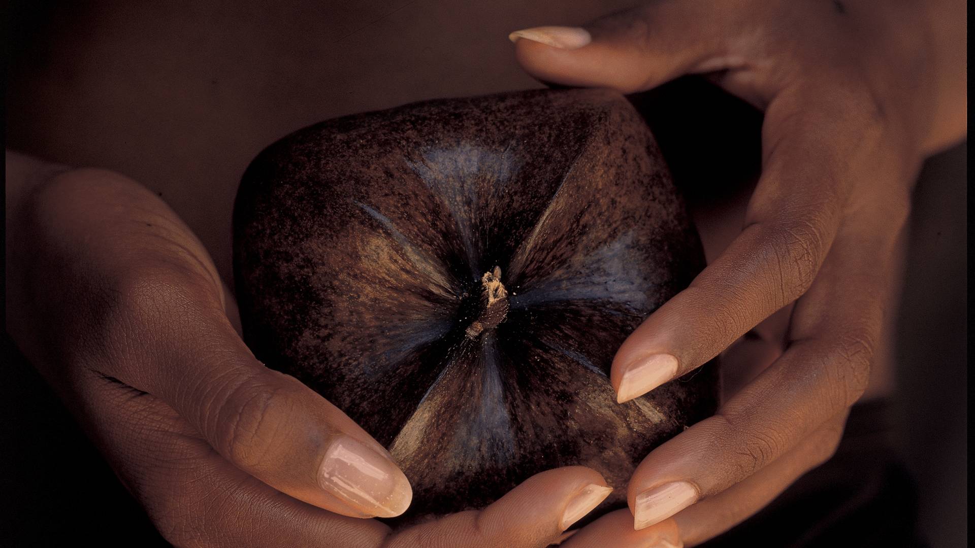 woman holding fruit