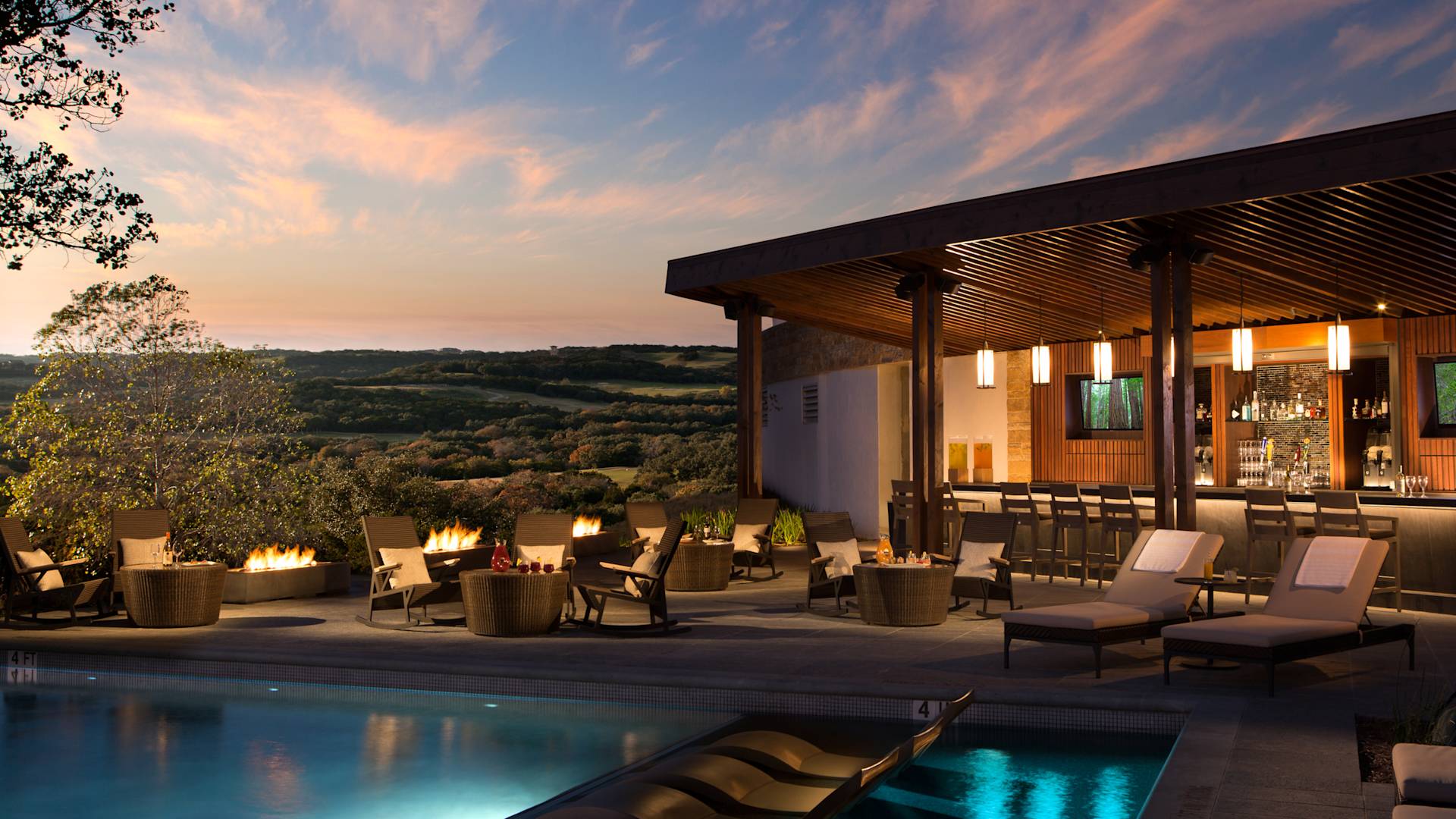 Topaz outdoor pool bar with beautiful sunset view
