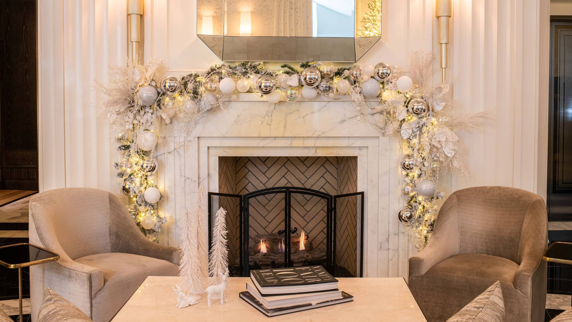 lobby fireplace with holiday decorations