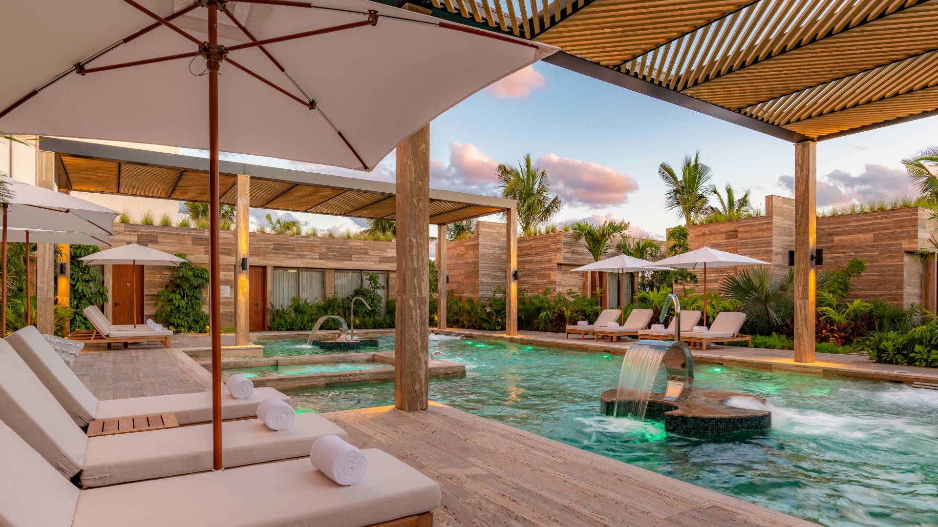 outdoor pool with lounge chairs
