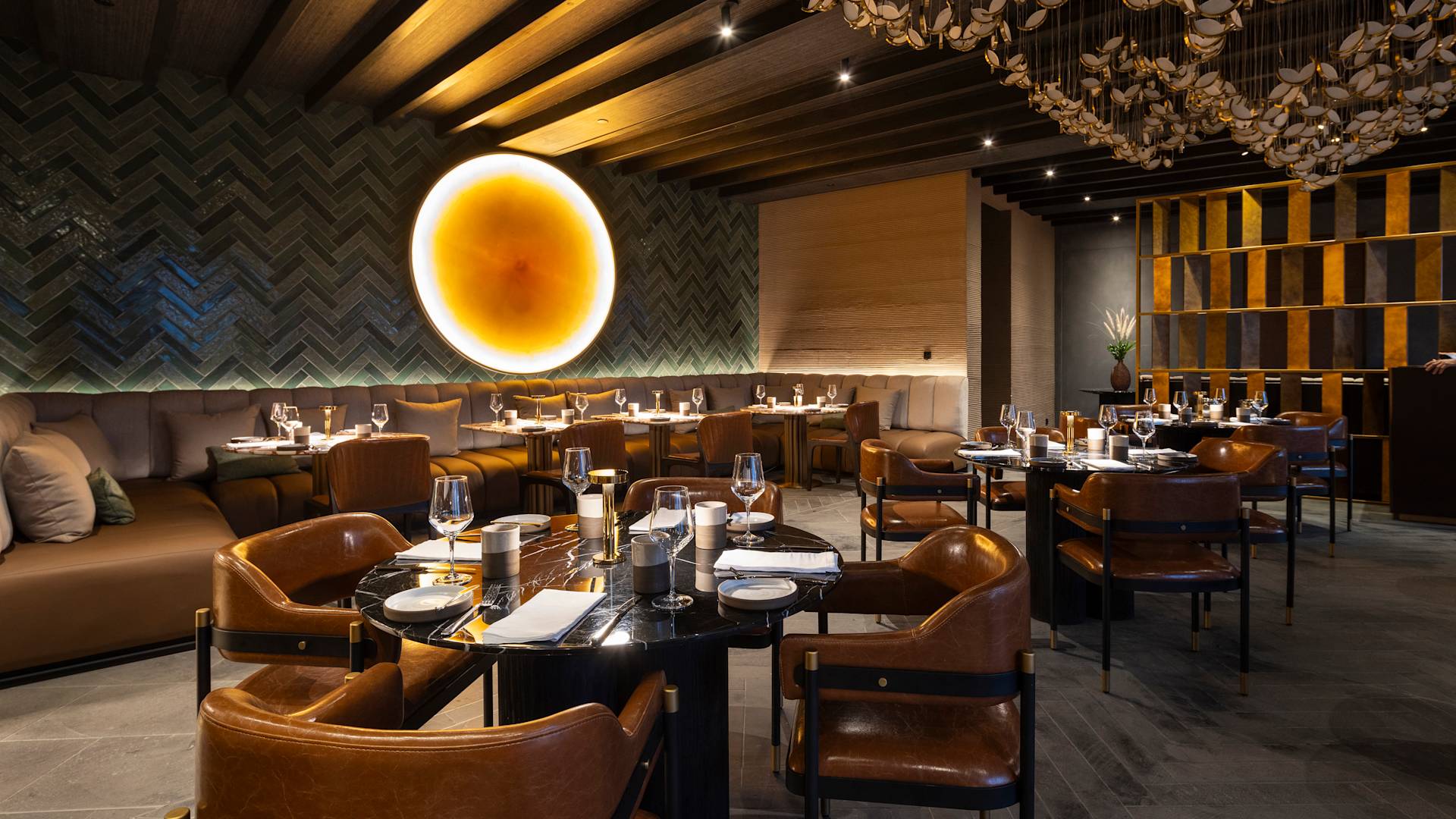 La Finca seating with large light wall fixture