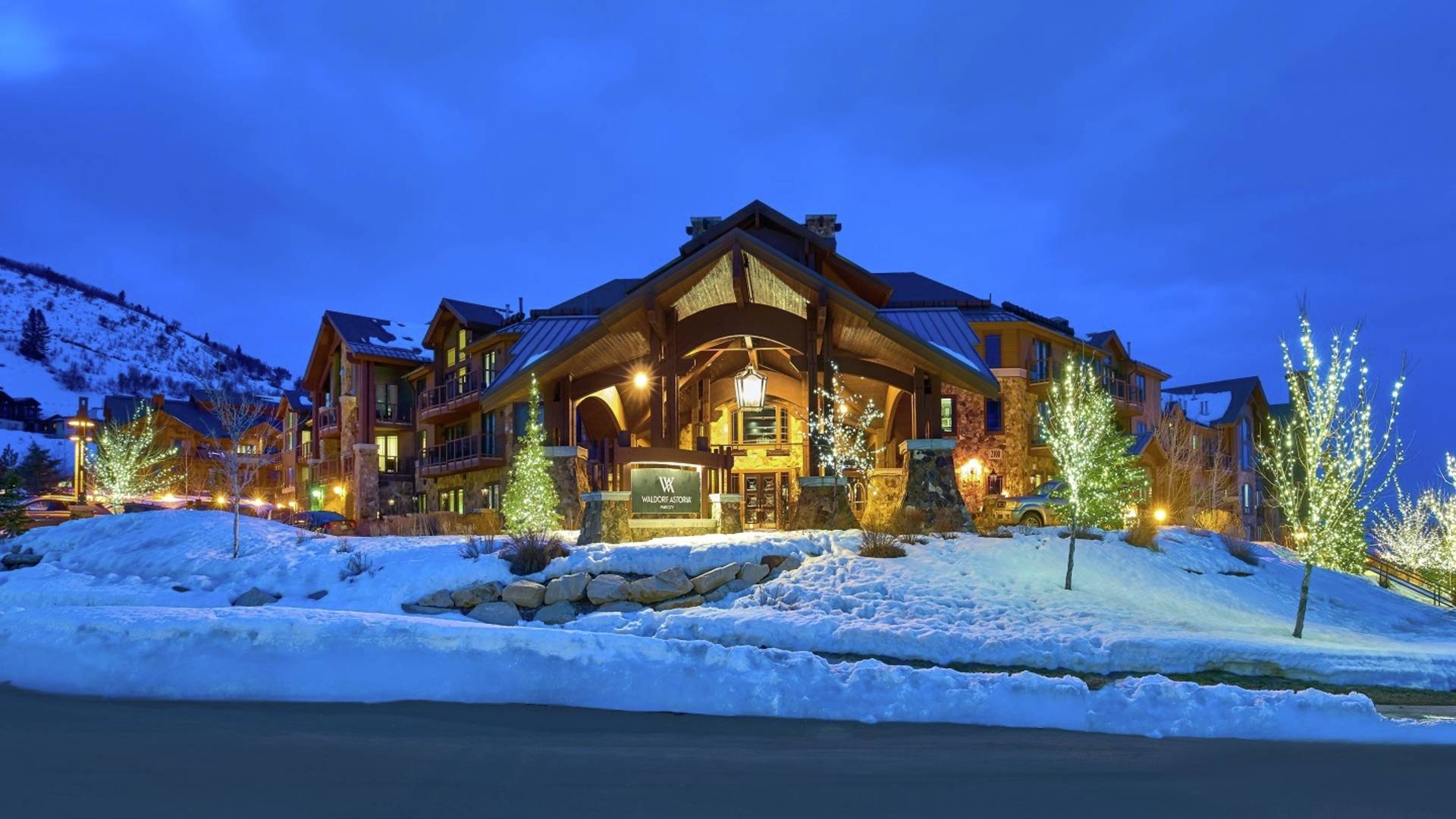 Hotel exterior at night with snow