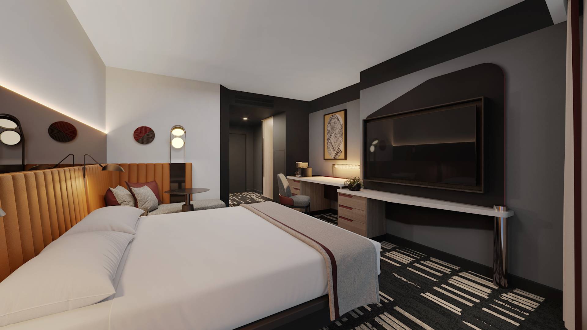 Pokoj s lůžkem King, pohovkou, stolem a židlí a TV