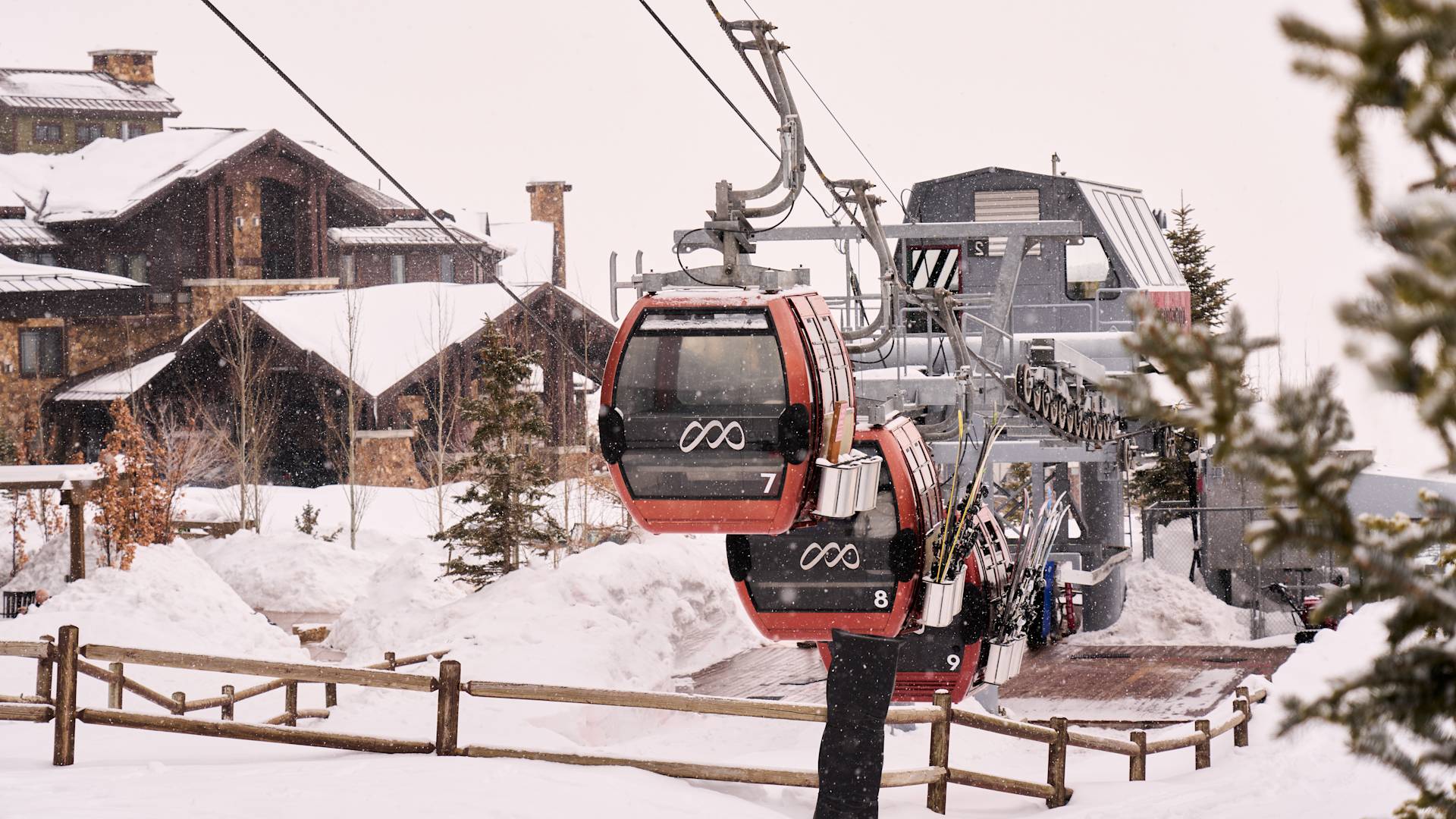 Cable cars with snow falling all around