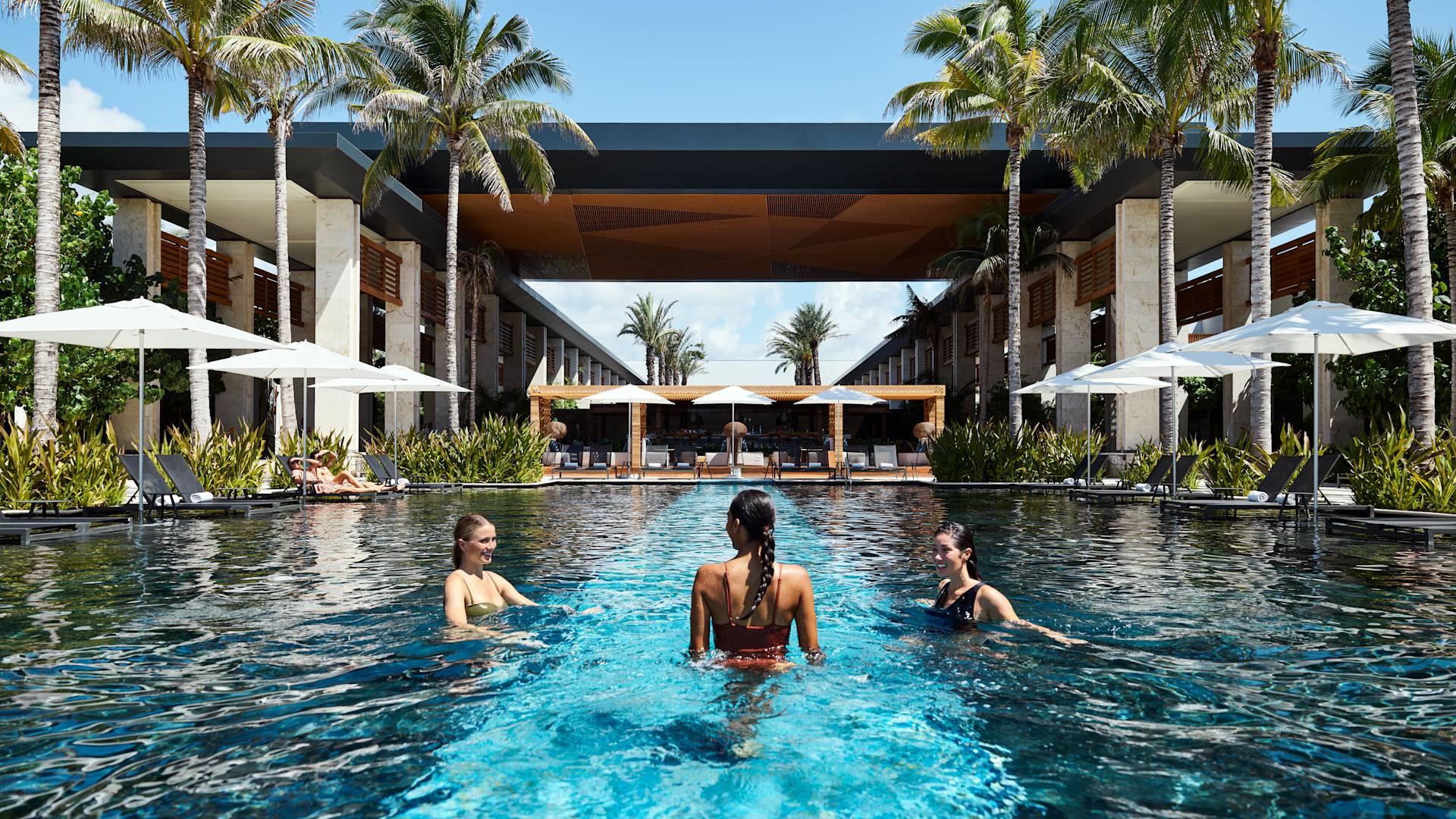 A group of people in a swimming pool-transition