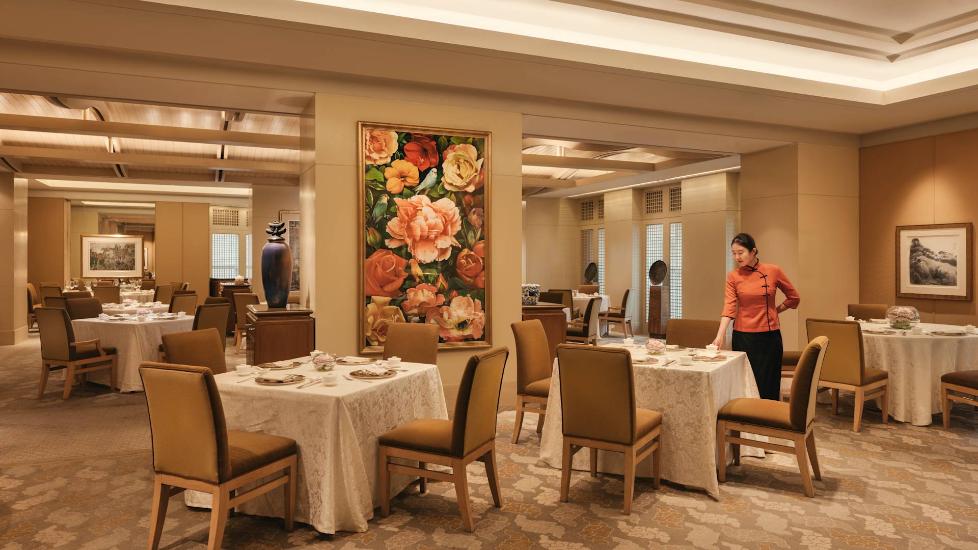 Server Setting a Table for Dining at Golden Peony-transition
