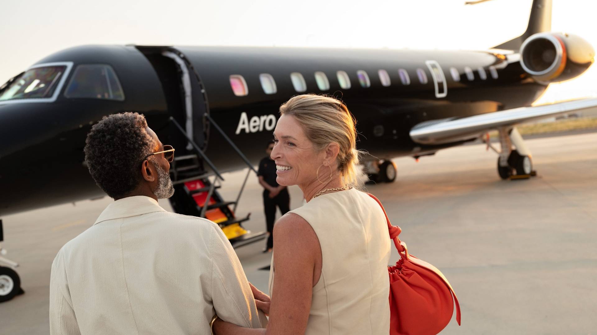 Couple Boarding a Private Airplane-transition
