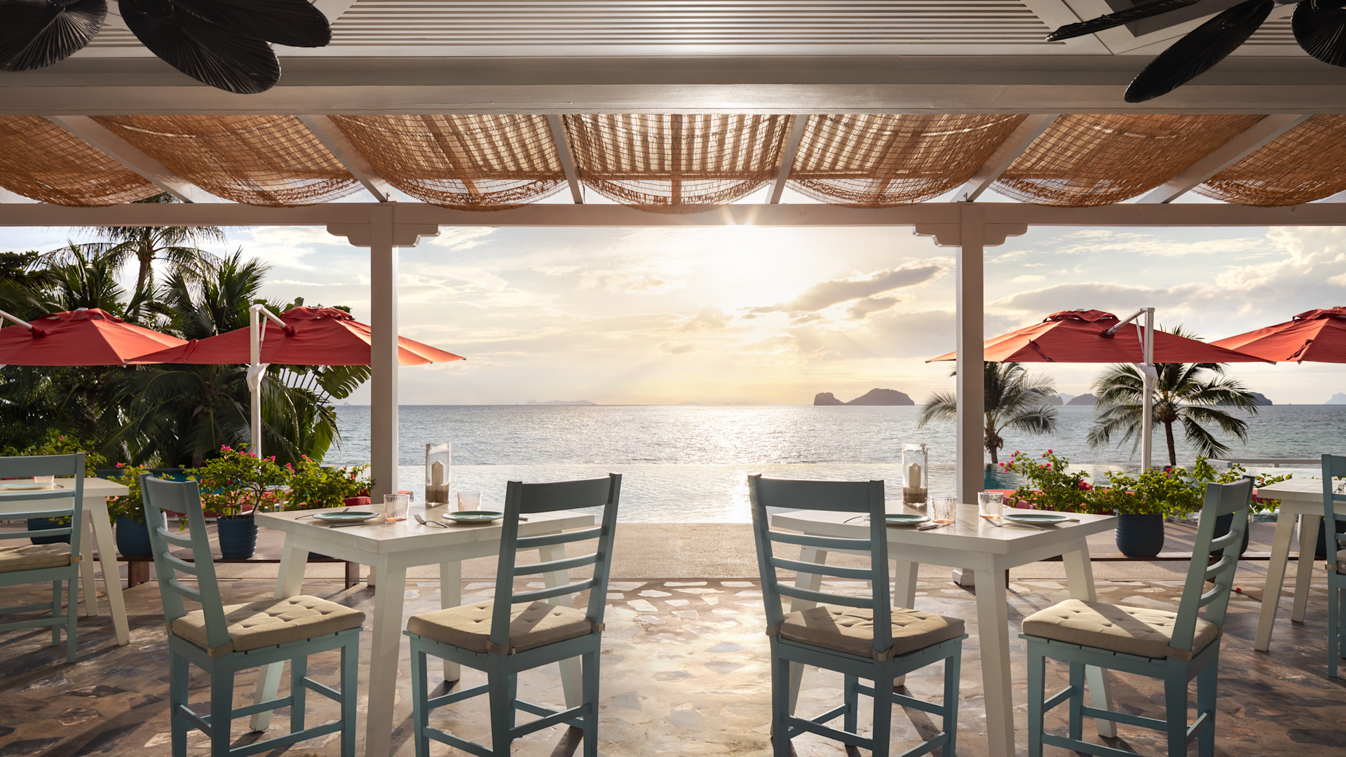 Dining Area of Azure Restaurant with Sea View at Sunset-transition
