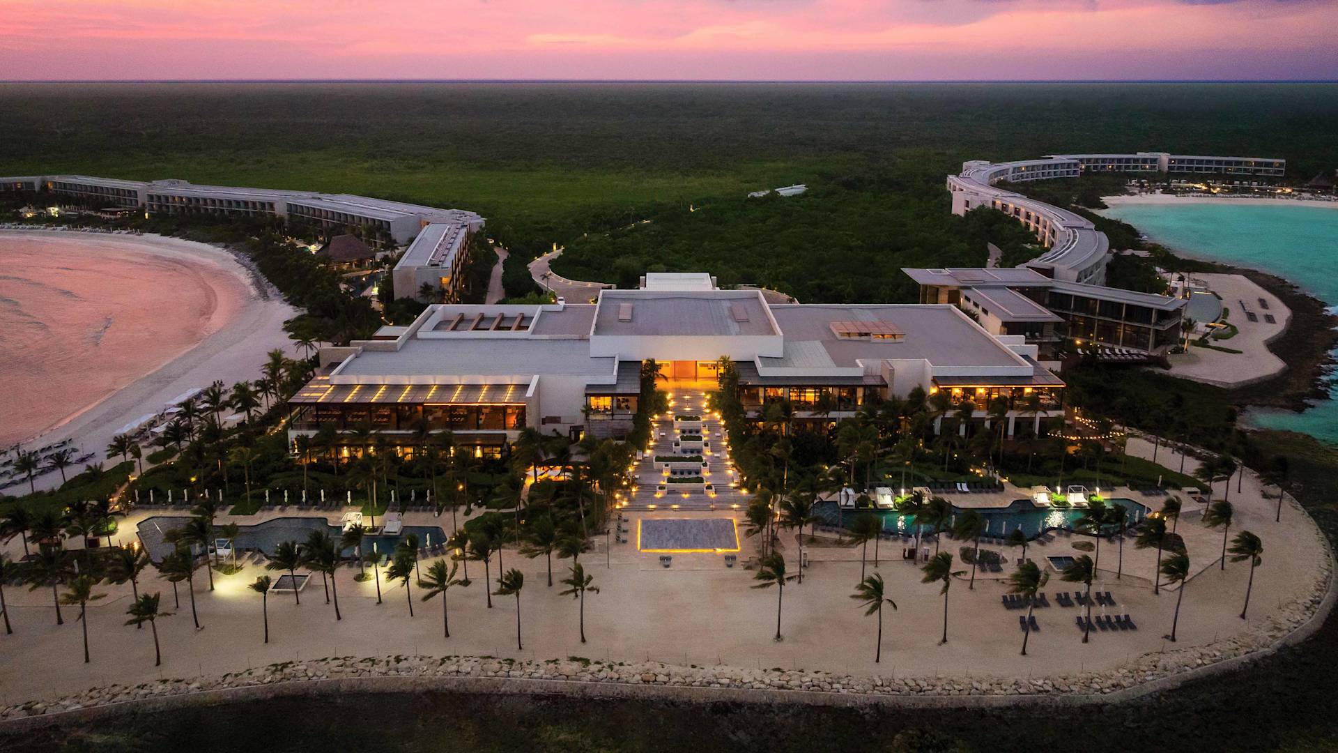 arial view of hilon cancun exterior at sunset-transition