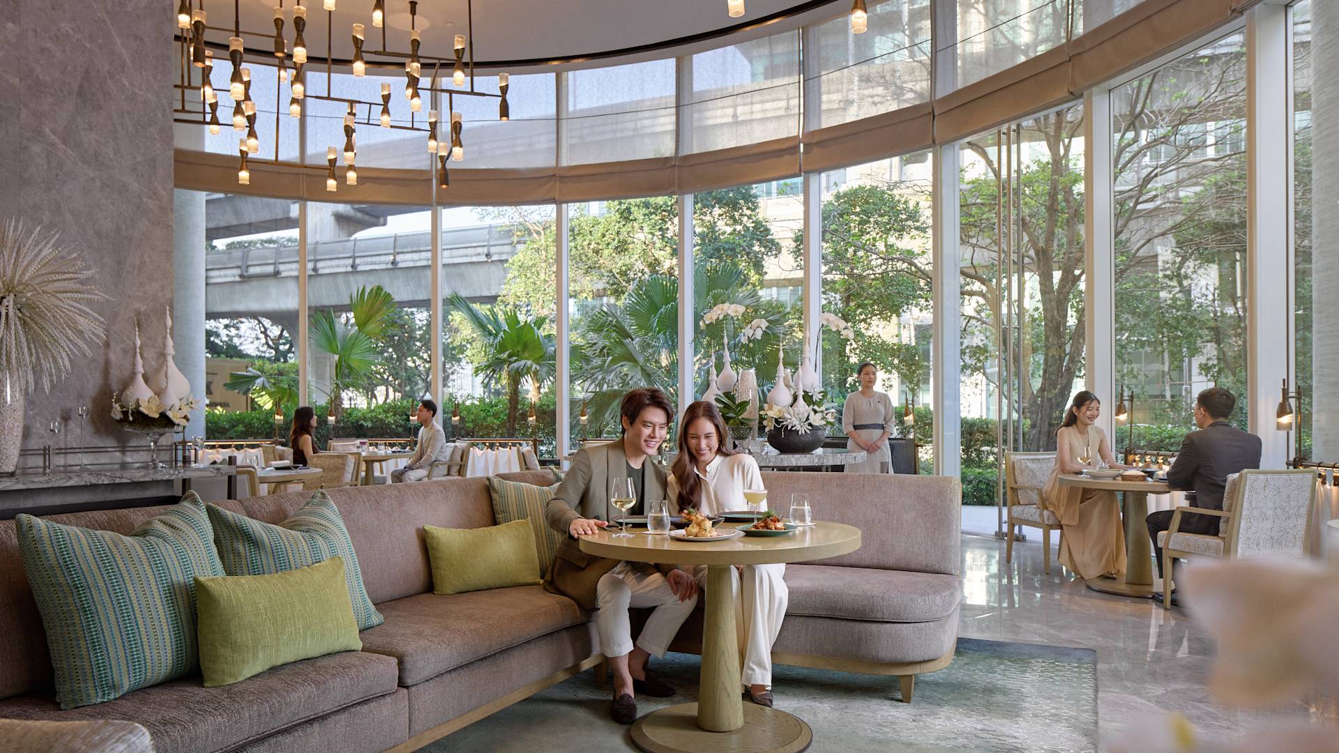 Guests Dining in Front Room-transition