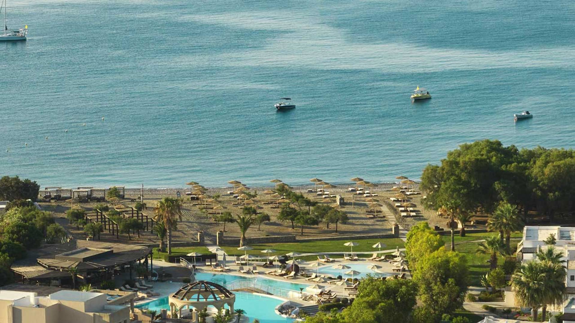 View of Hotel Exterior With Beach-transition