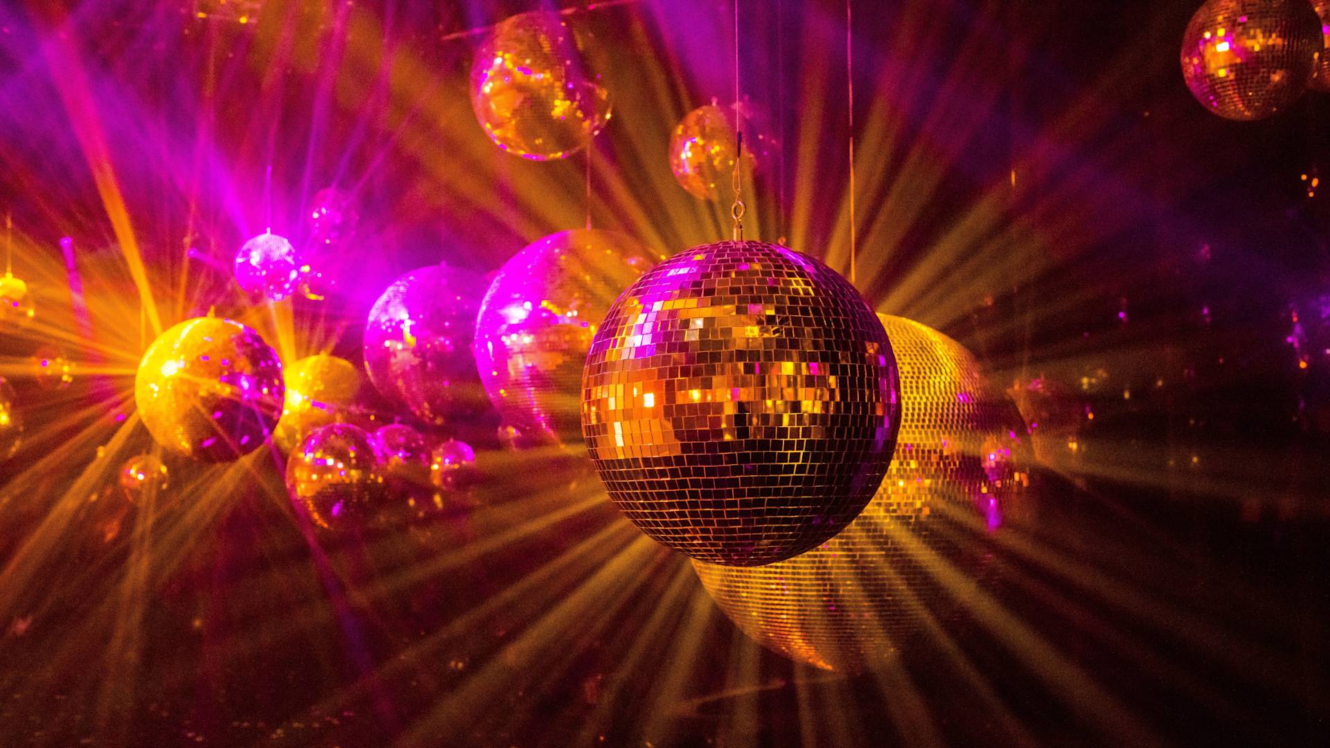 Disco Balls Reflecting Colorful Lights