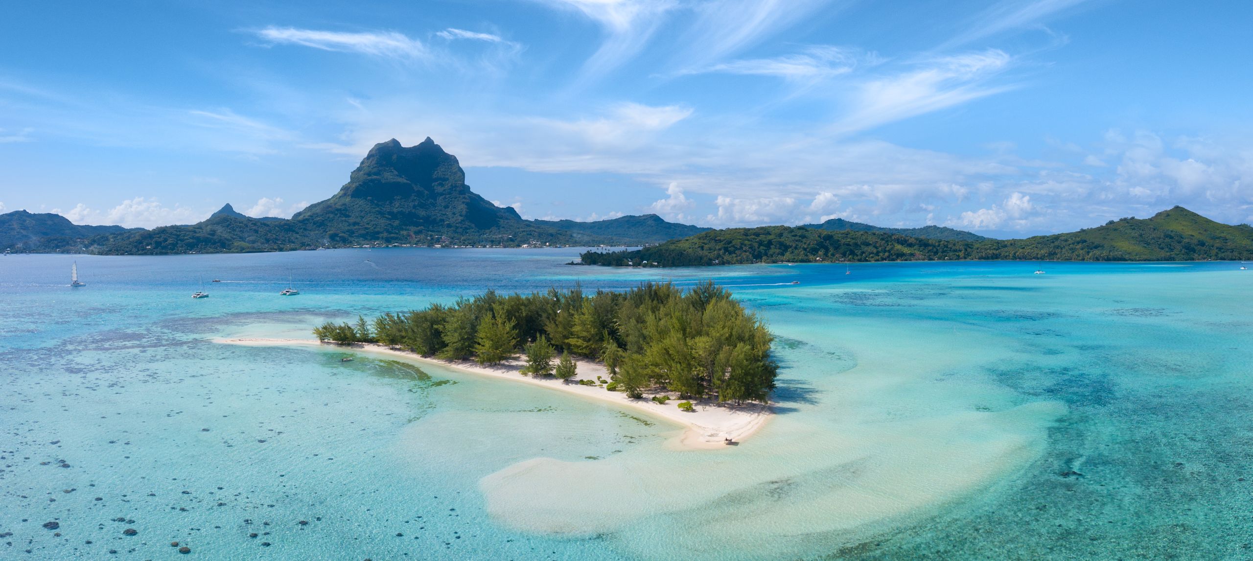 Panoramic view of an island and mountains in background